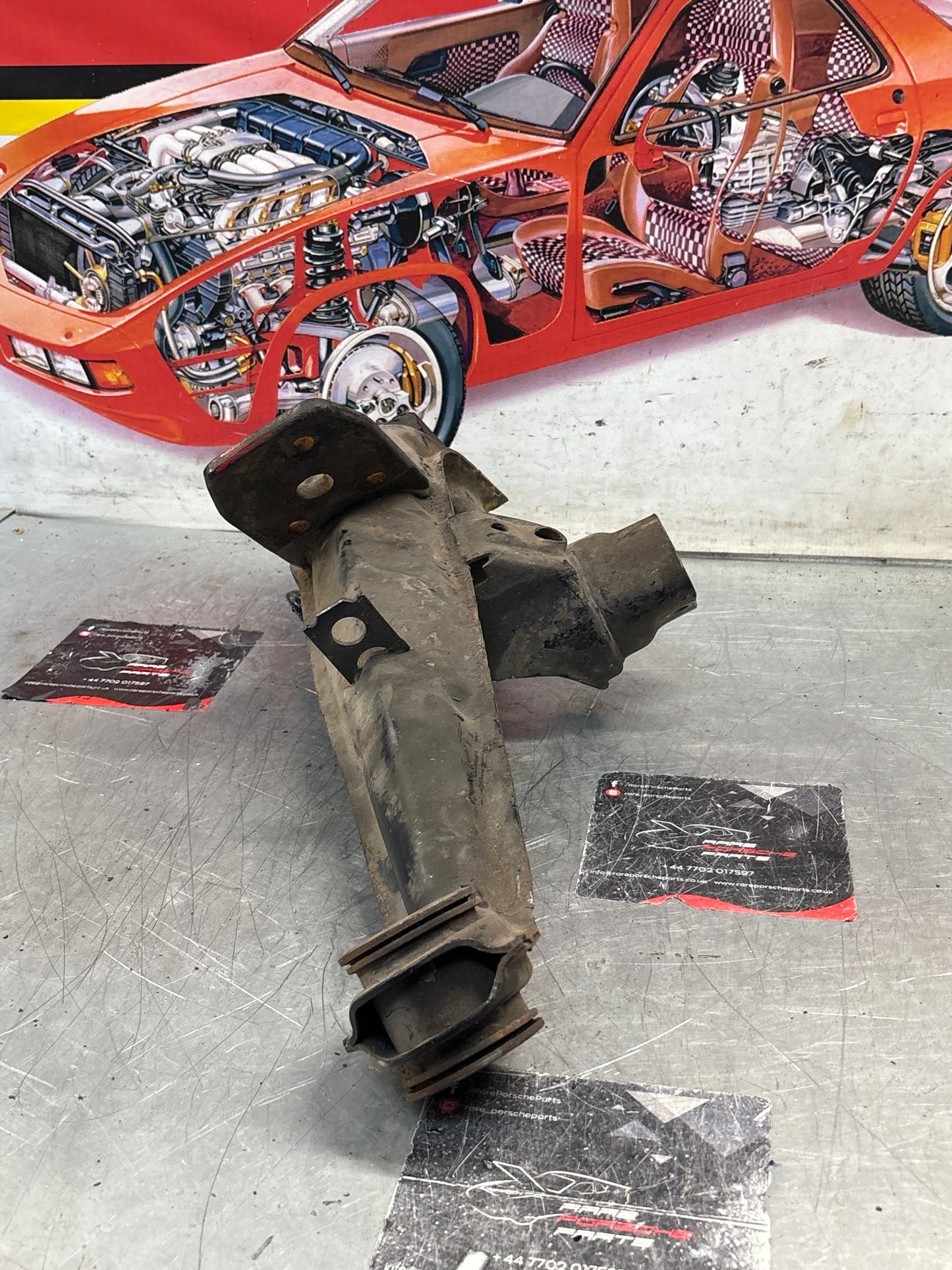 Porsche 924 944 -85.5 Rear left trailing arm, used 94433102100