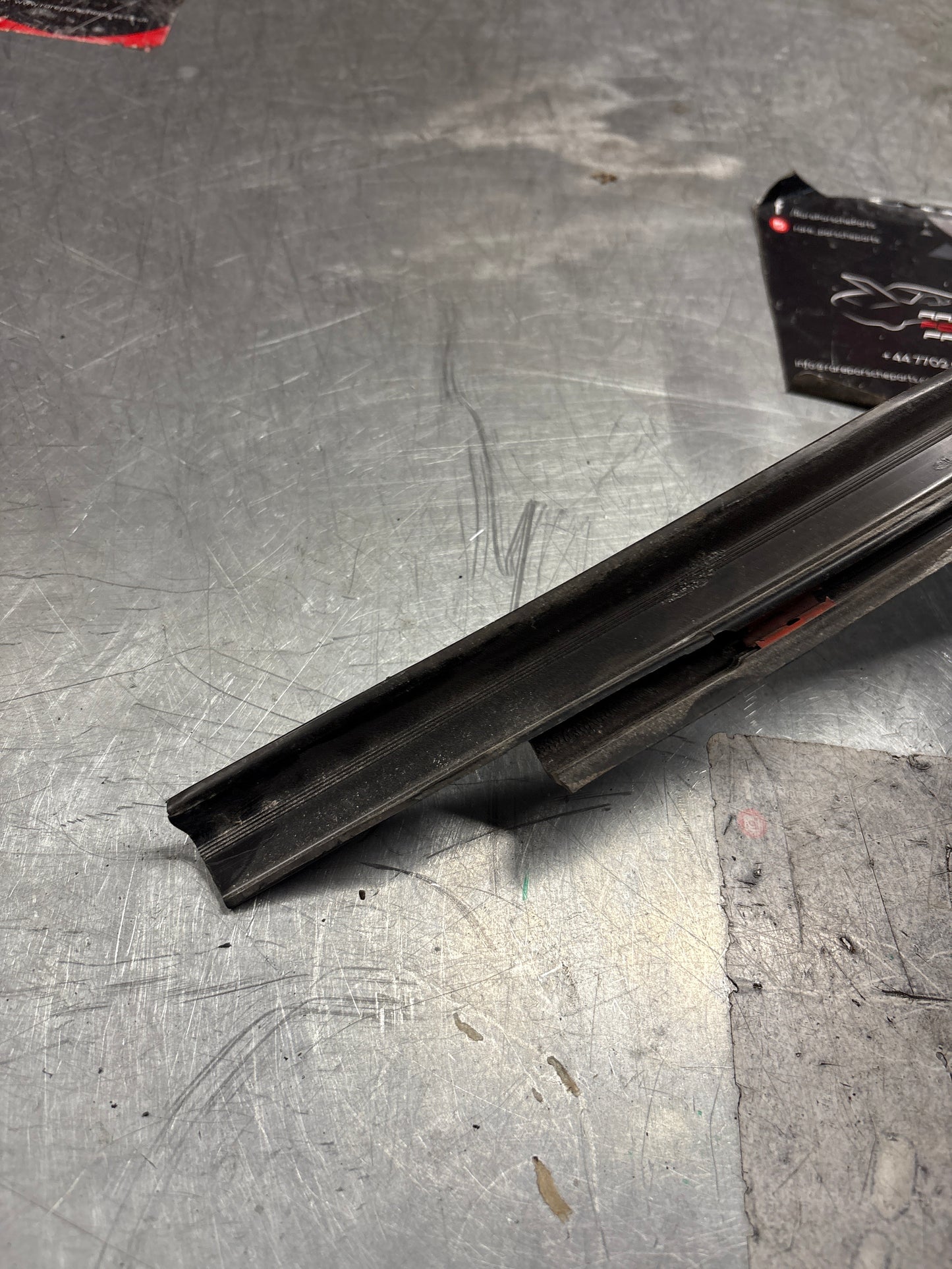 Porsche 944 85.5- left sill trim, scuff plate used 94455112100 cracked