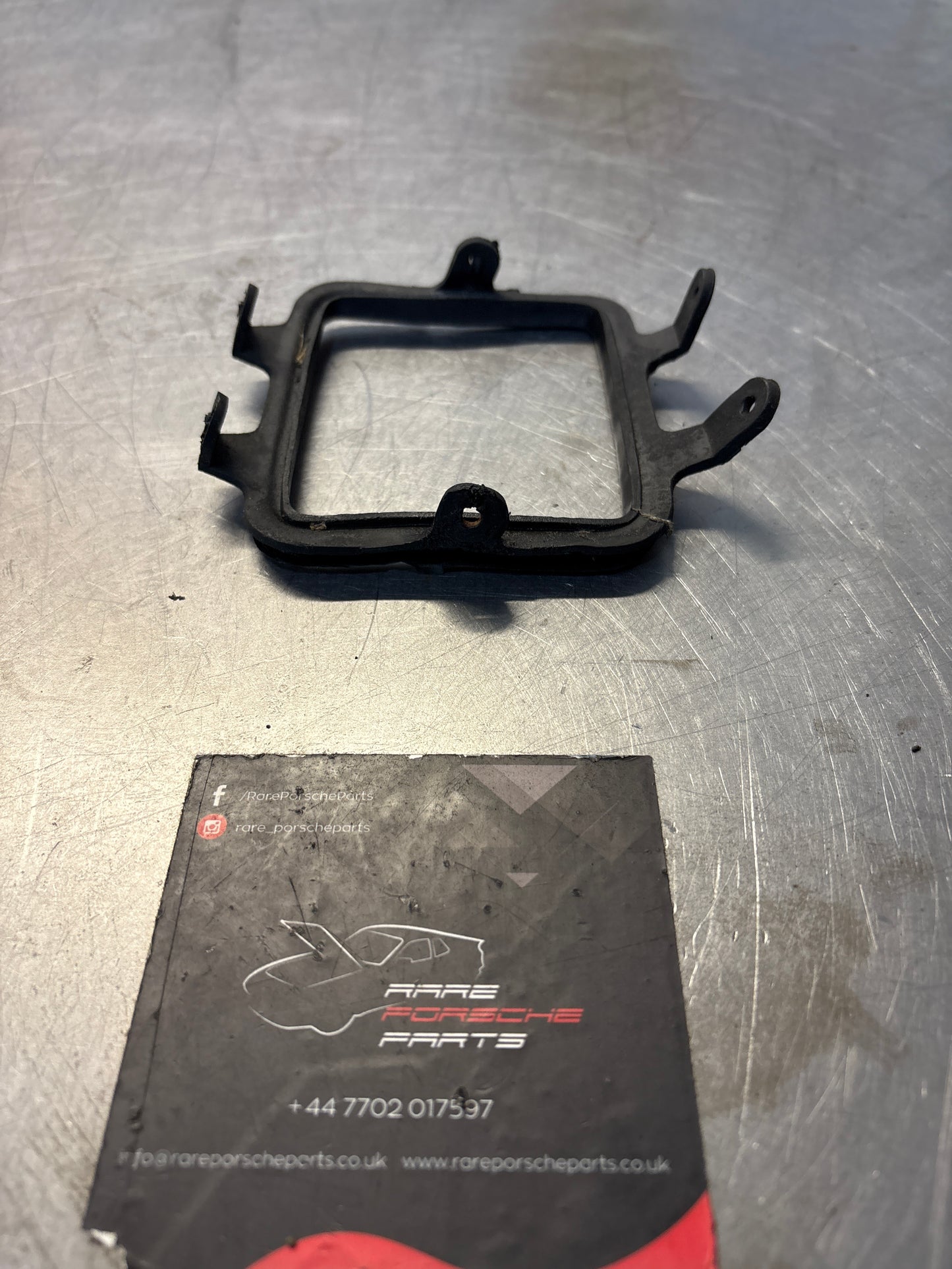 Porsche 928 rear fog light frame, left, used 92850528502