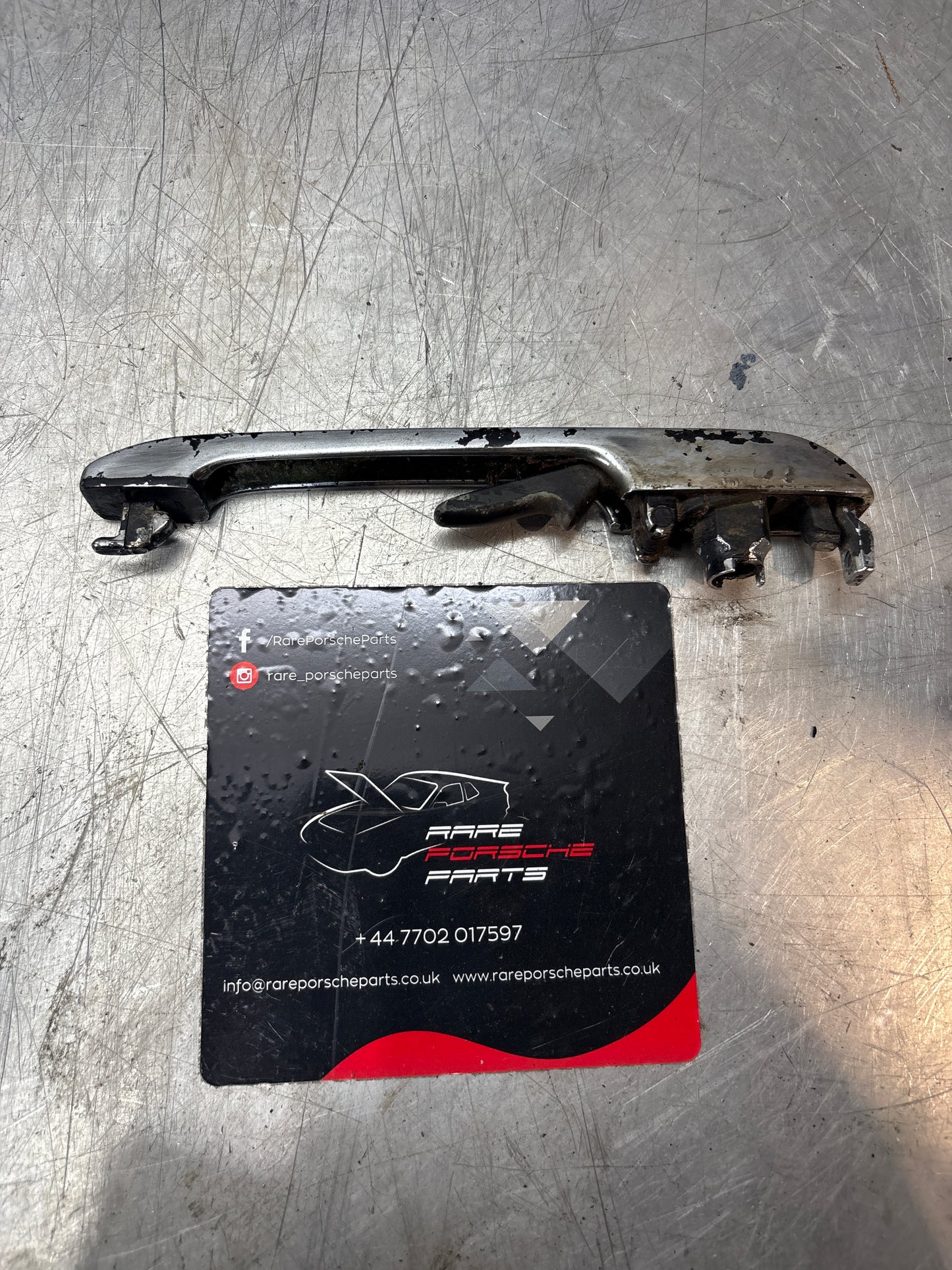Porsche 924 early 76-79 Left or Right door handle without lock cylinder, chrome 477837037H, used