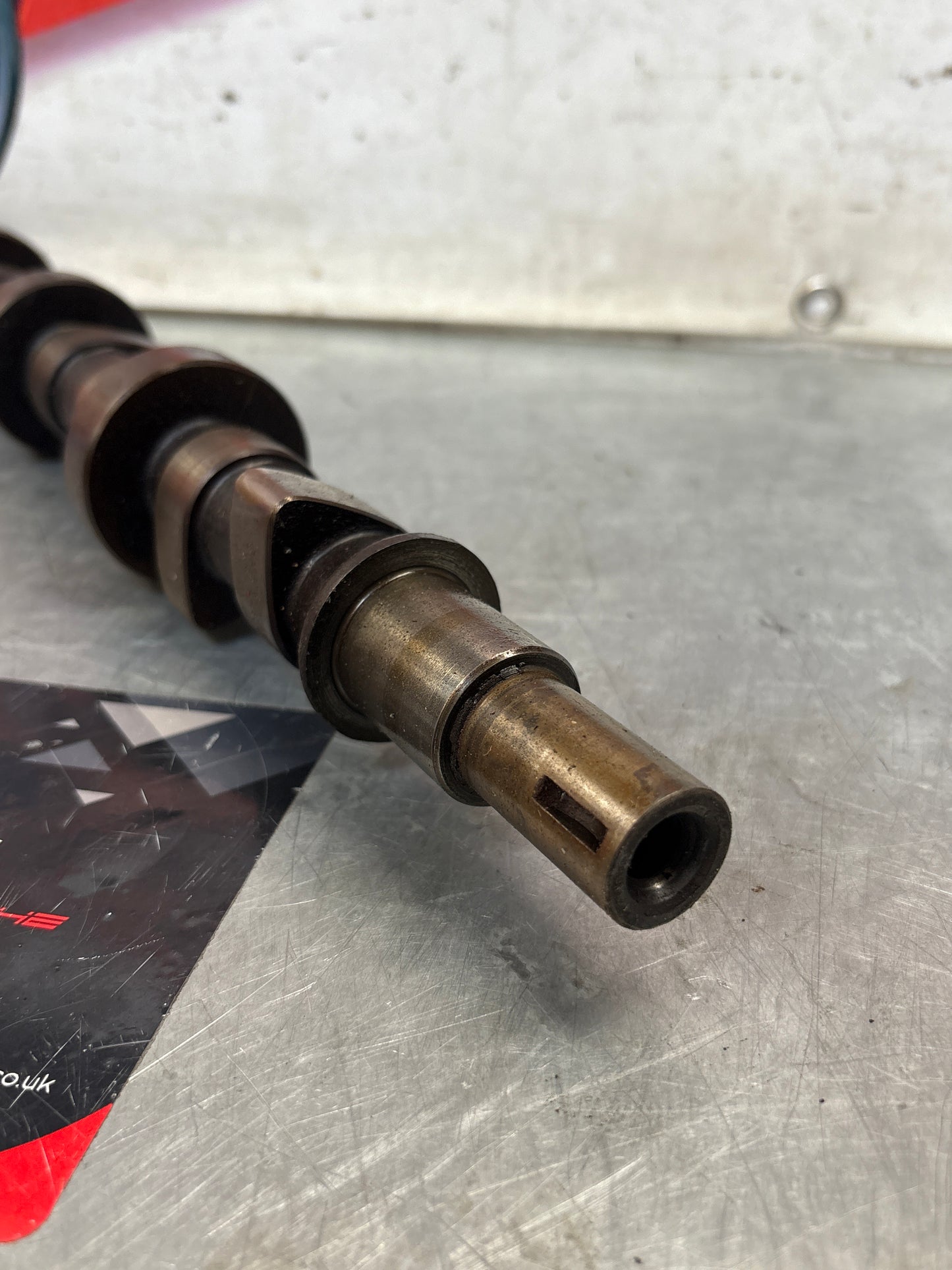 Porsche 928 cam shaft, used 9281051553R