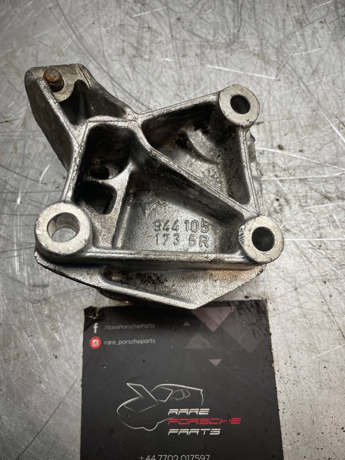 Porsche 924S / 944 belt tensioner support bracket, used 9441051736R 94410517306