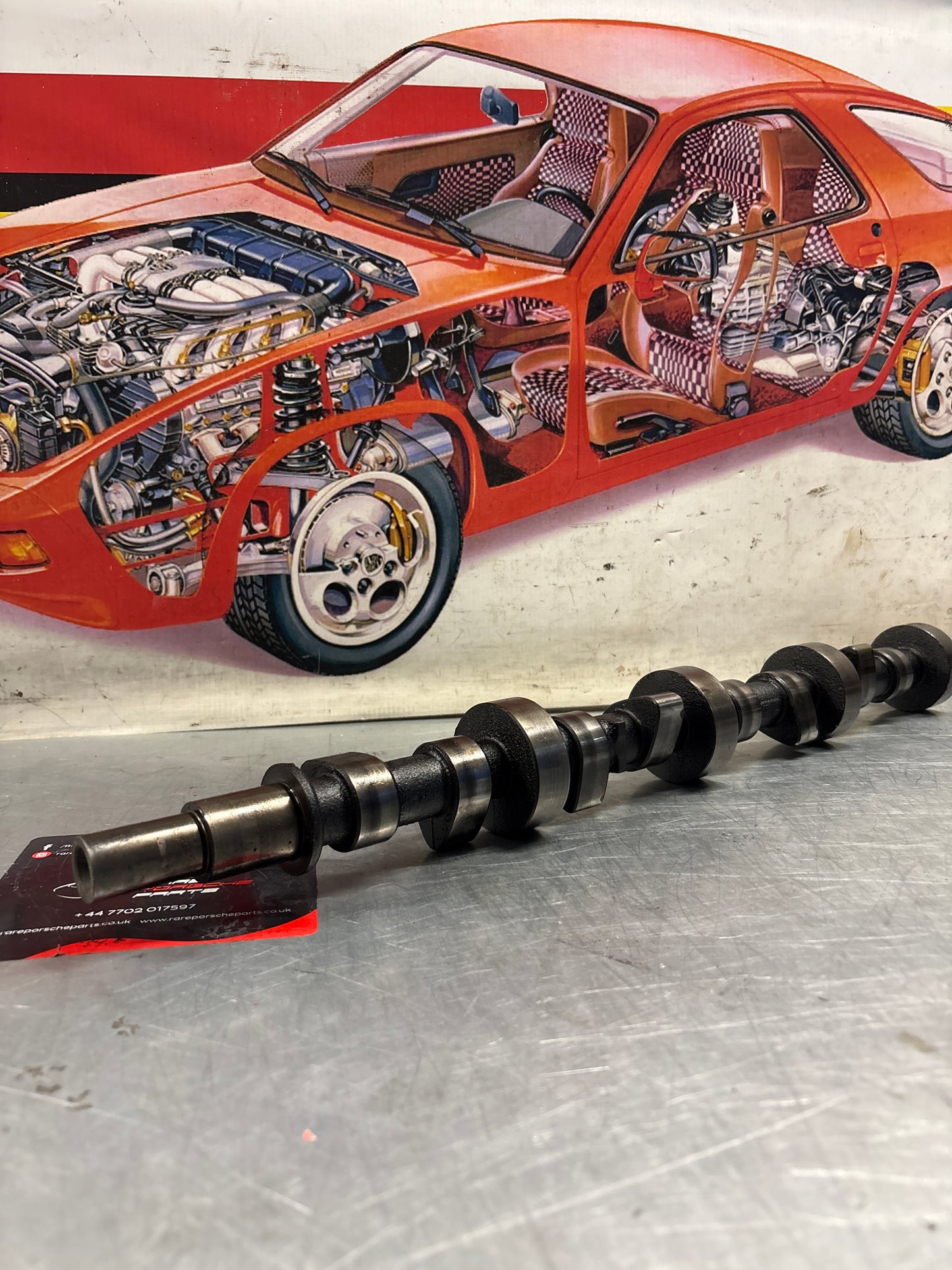 Porsche 928 cam shaft, used 9281051870R