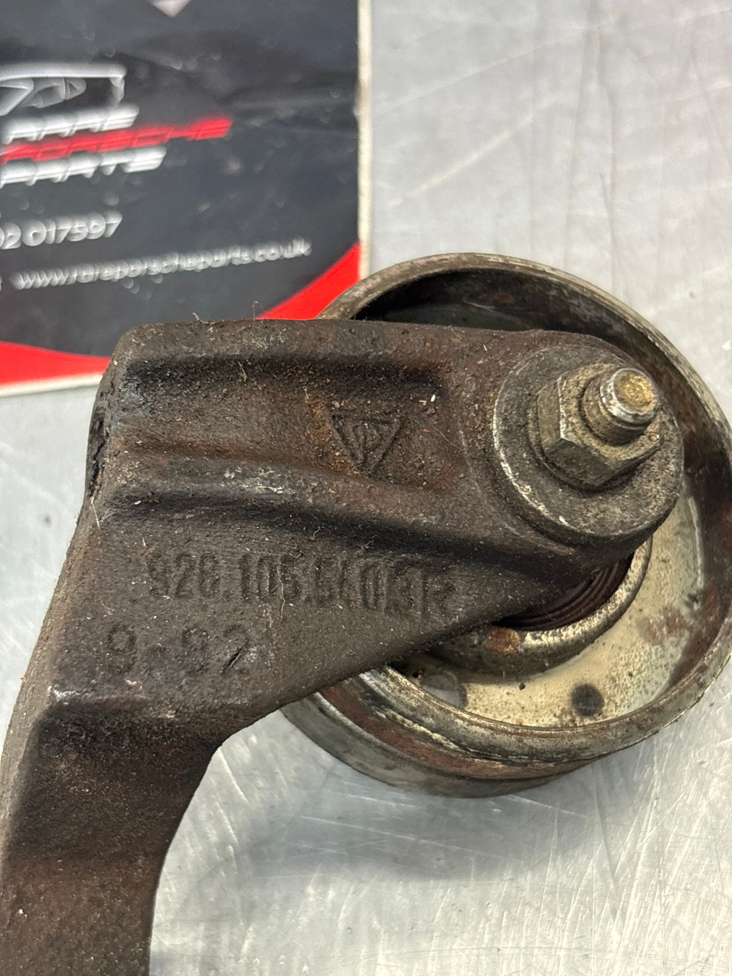 Porsche 928 belt tensioner bracket, used 9281055403R / 92810554003