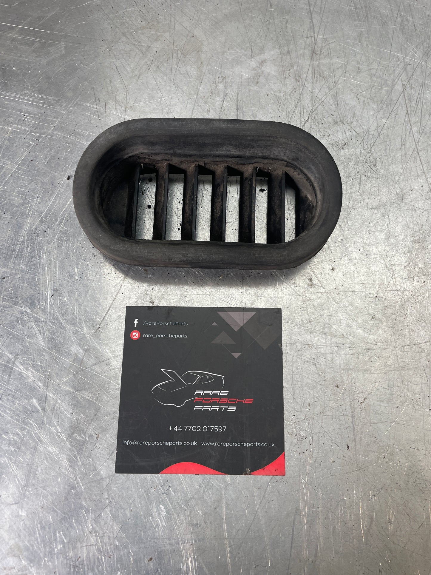 Porsche 924/944/968 Left door air vent grill trim, used 477819179A