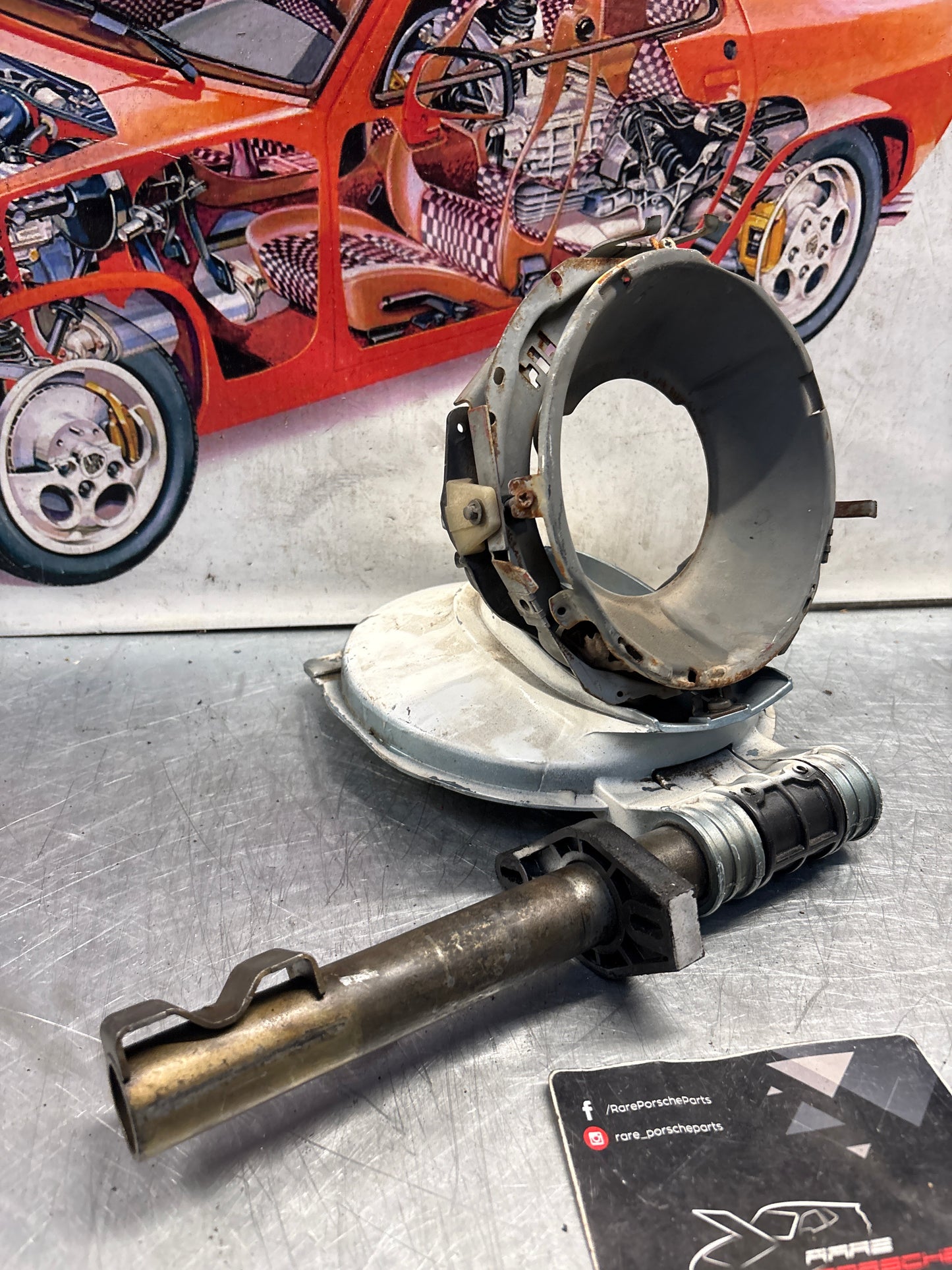 Porsche 928 right headlight swivel frame 92875024902 92875024302 used