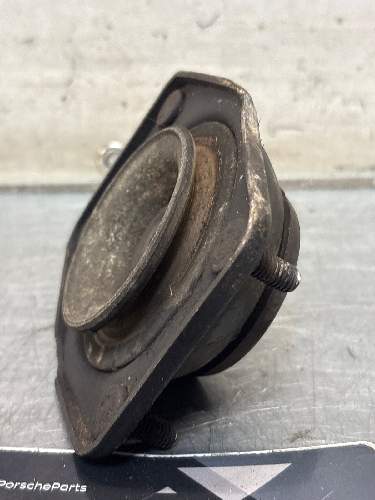 Porsche 924 / 944 front suspension bearing flange, 477412345, used