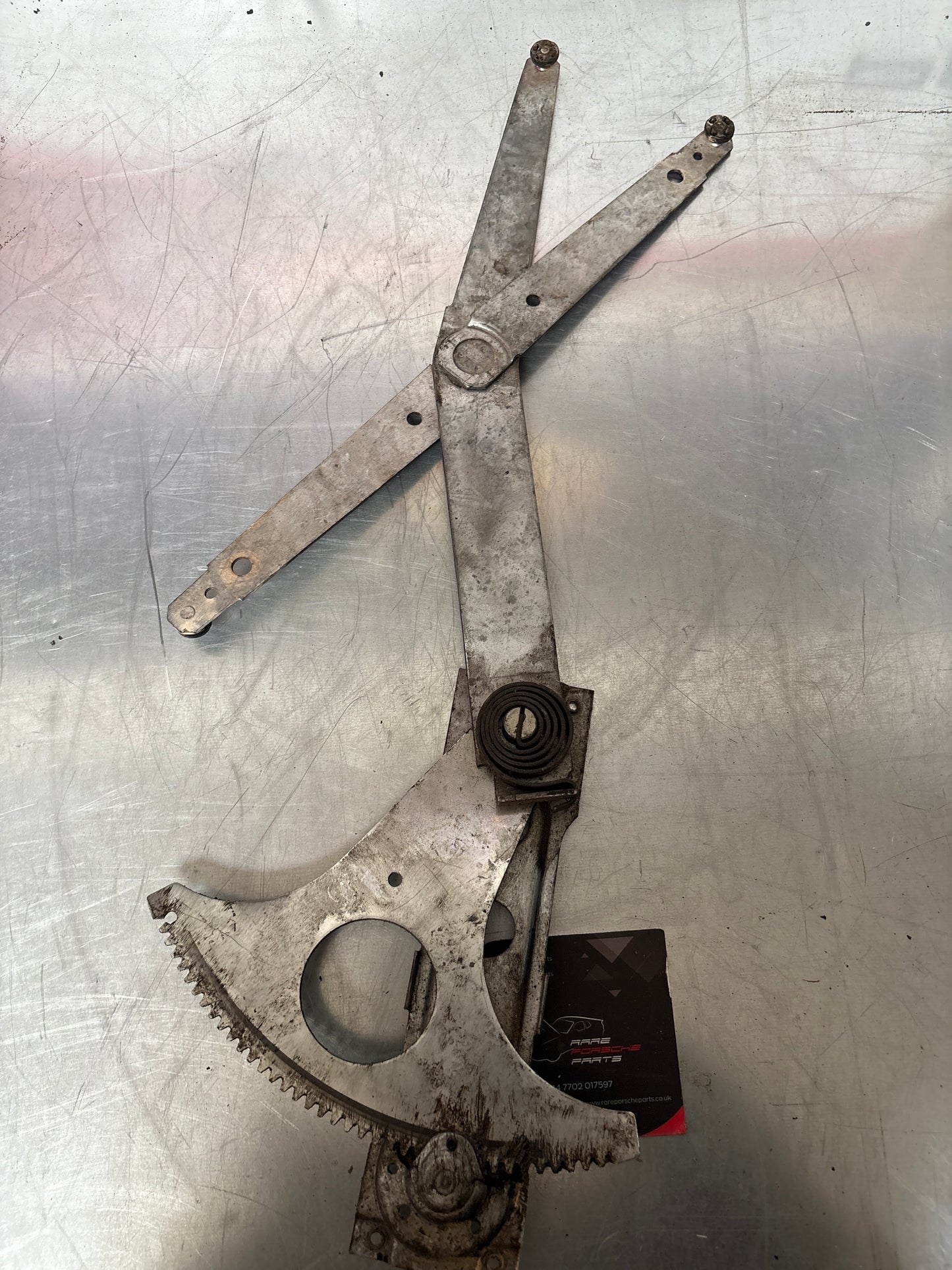 Porsche 924 944 Manual window regulator, used, left 477837441A