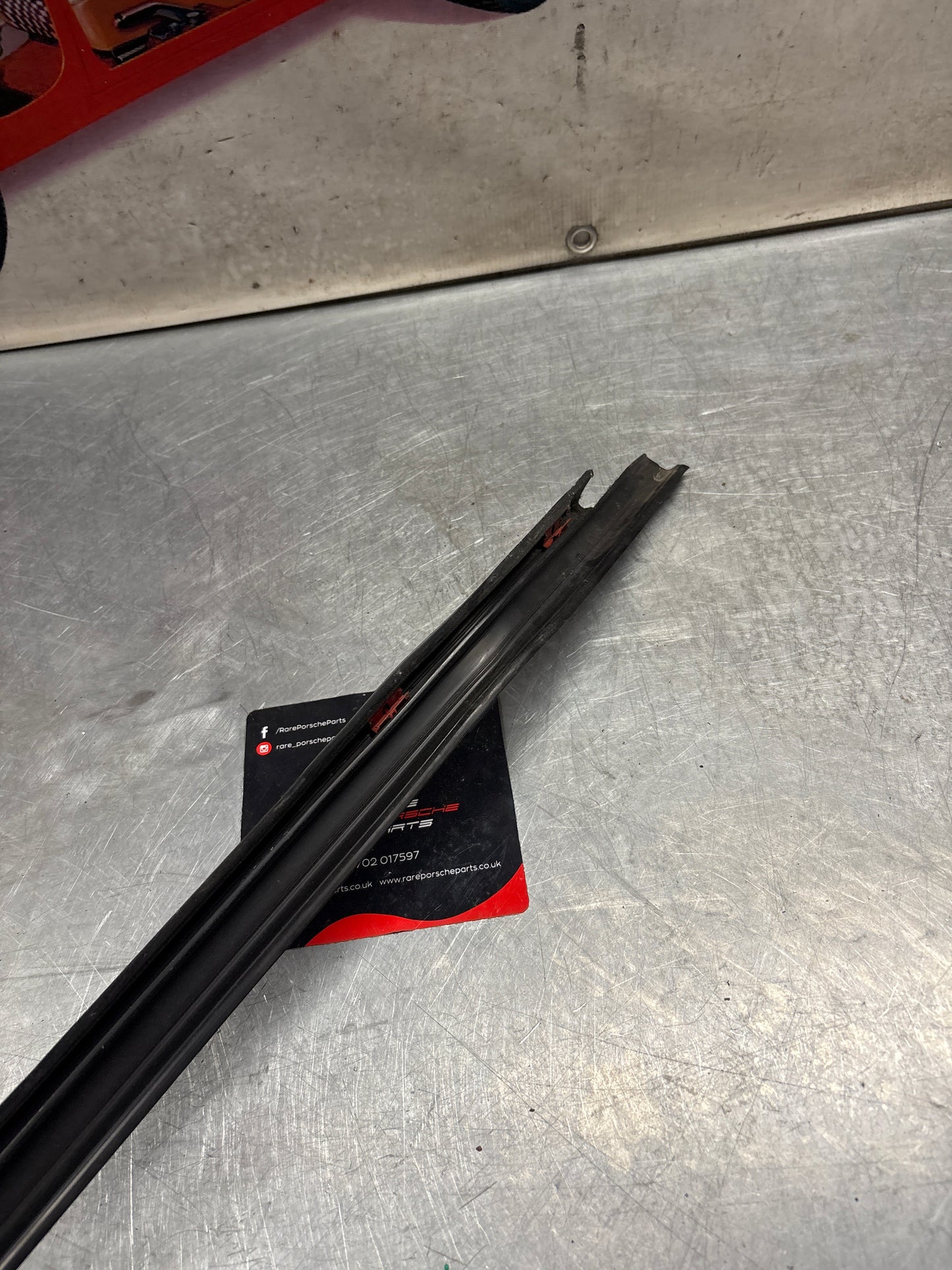 Porsche early 924/944 left sill trim, used 477853657A