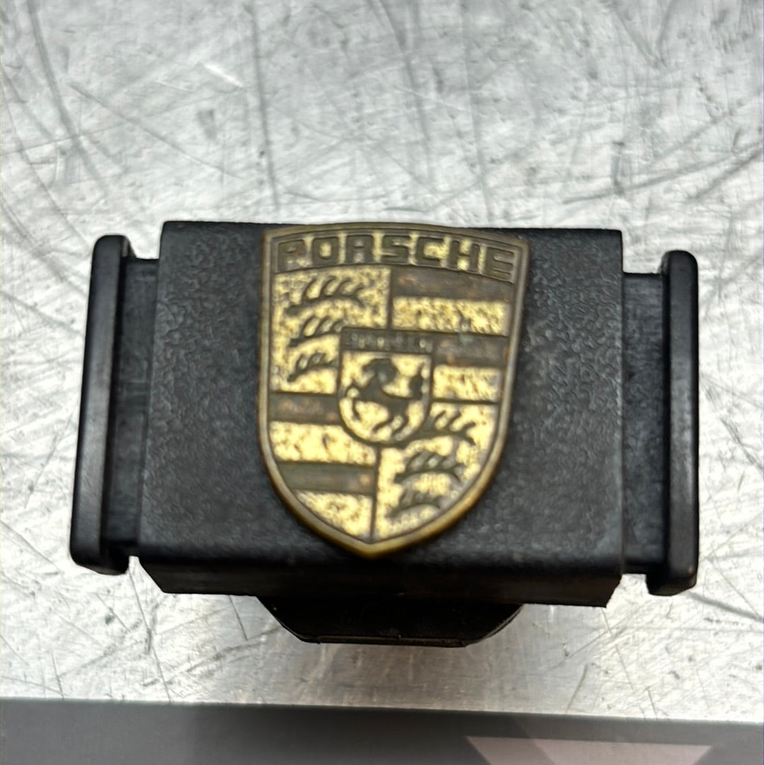 Porsche 924/944 black glove box lock with badge 477857133 used