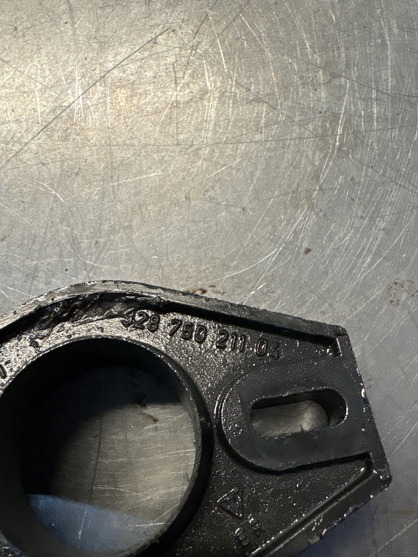 Porsche 928 headlight bearing bracket, used 92875021104