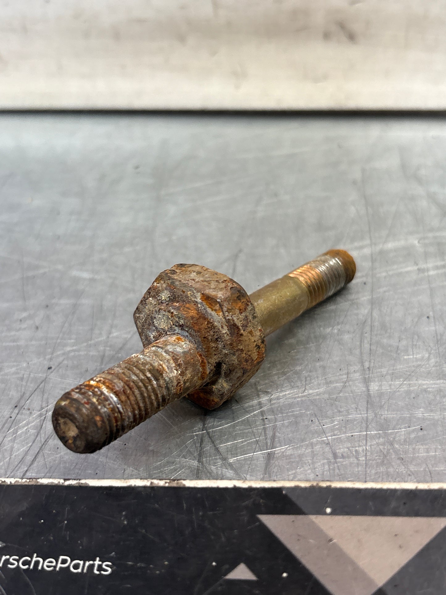 Porsche 924 / 944 rear axle eccentric bolt, 477511516, used