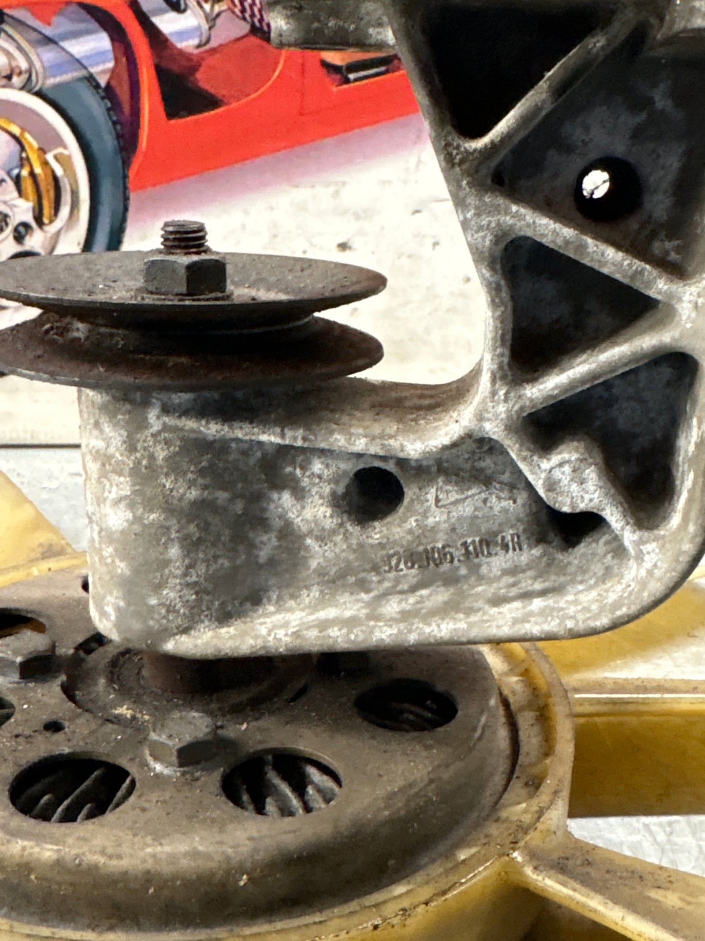 Porsche 928 late engine cooling fan clutch with bracket, used 92810611205 / 92810613701 / 9281061104R