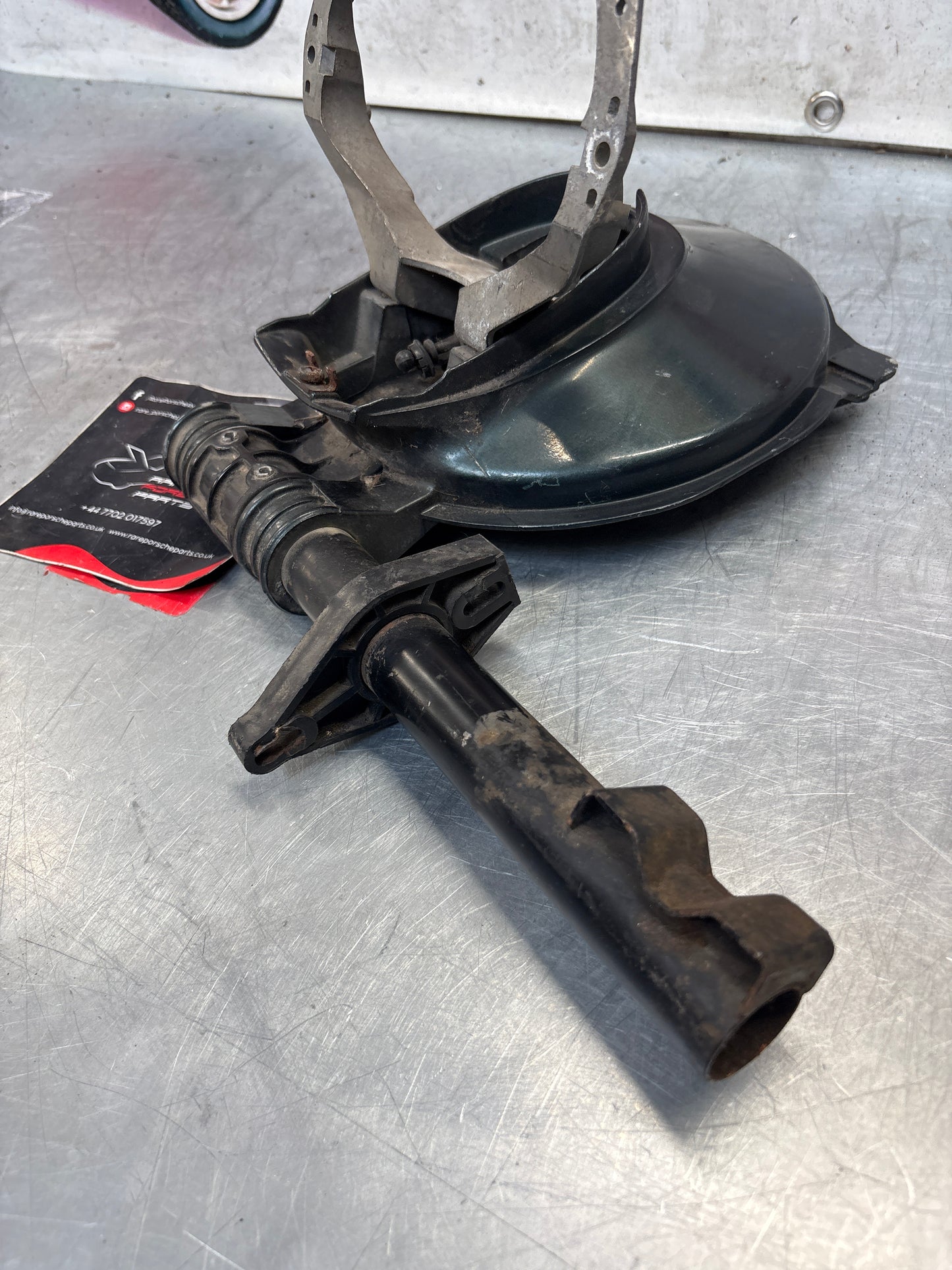 Porsche 928 left headlight swivel frame 92875024902 92875024302 used