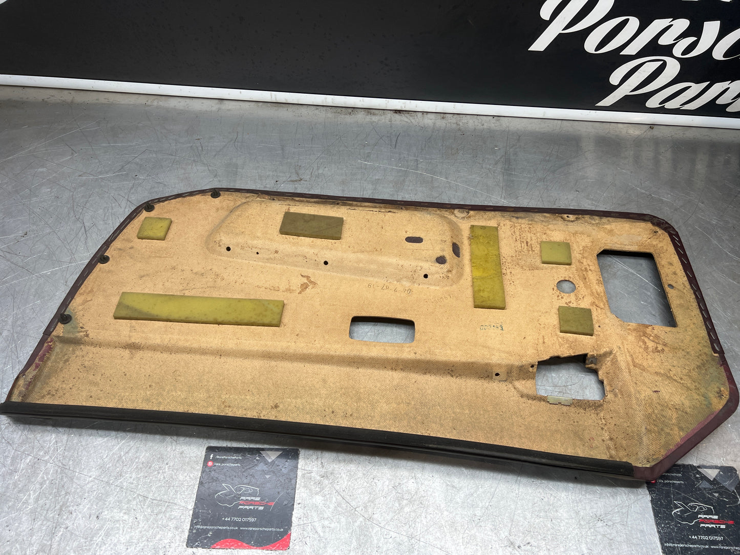 Porsche 944 left burgundy door card for late cars from 85.5 944555017