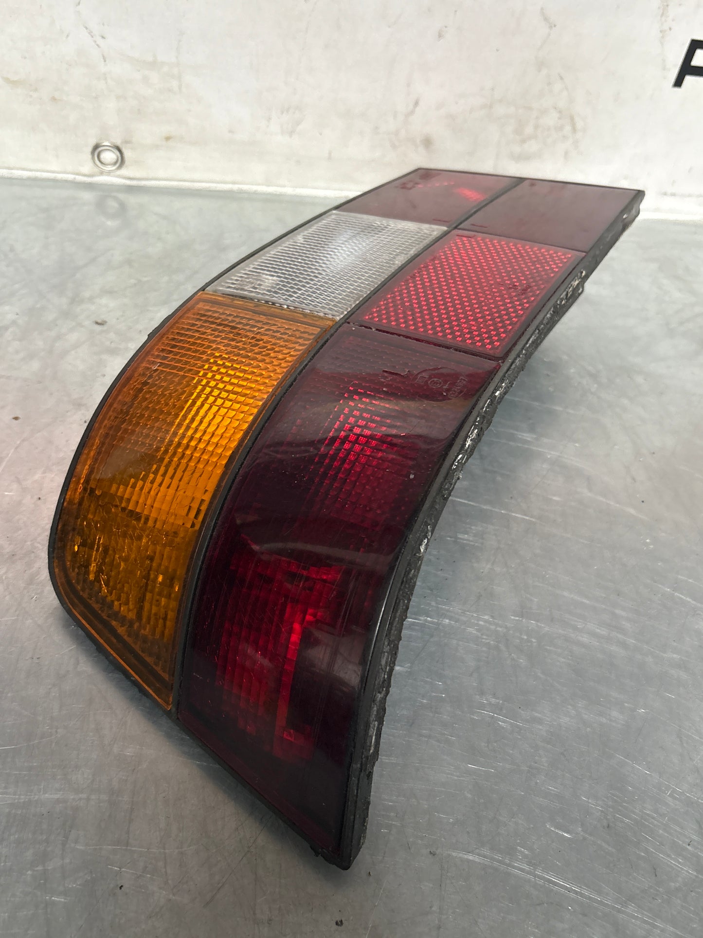Porsche 944 left rear tail light 477945205 used