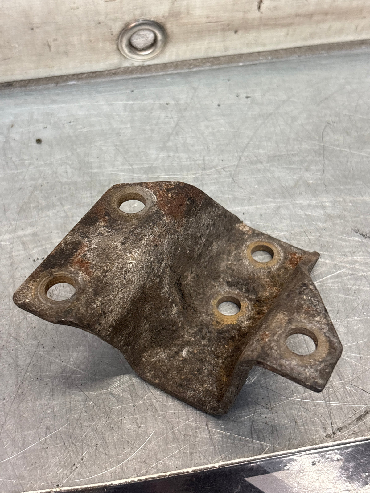 Porsche 924 944 hook trestle bracket, right, used 477399168E