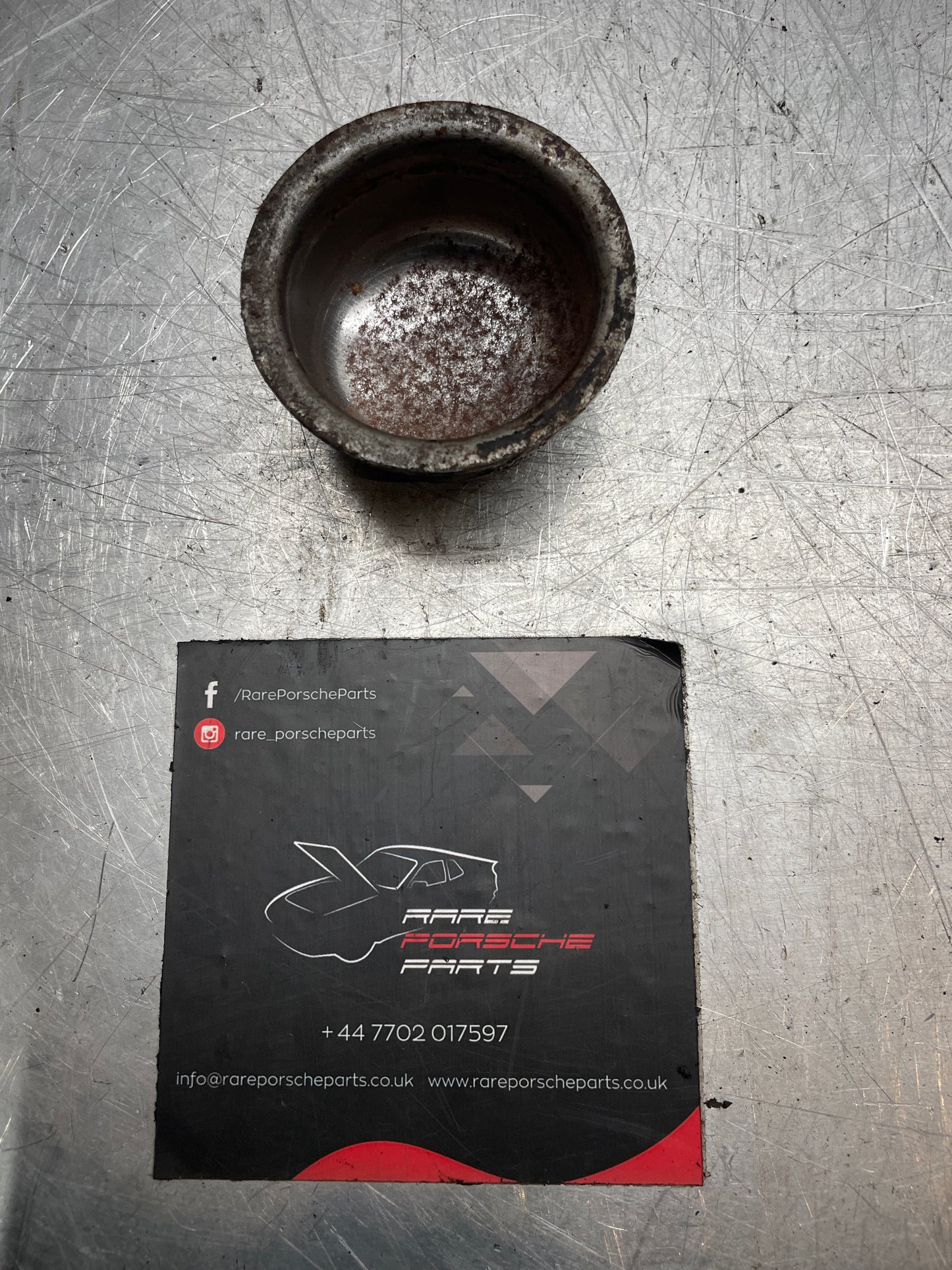 Porsche 924 front wheel hub cover, used 477405692