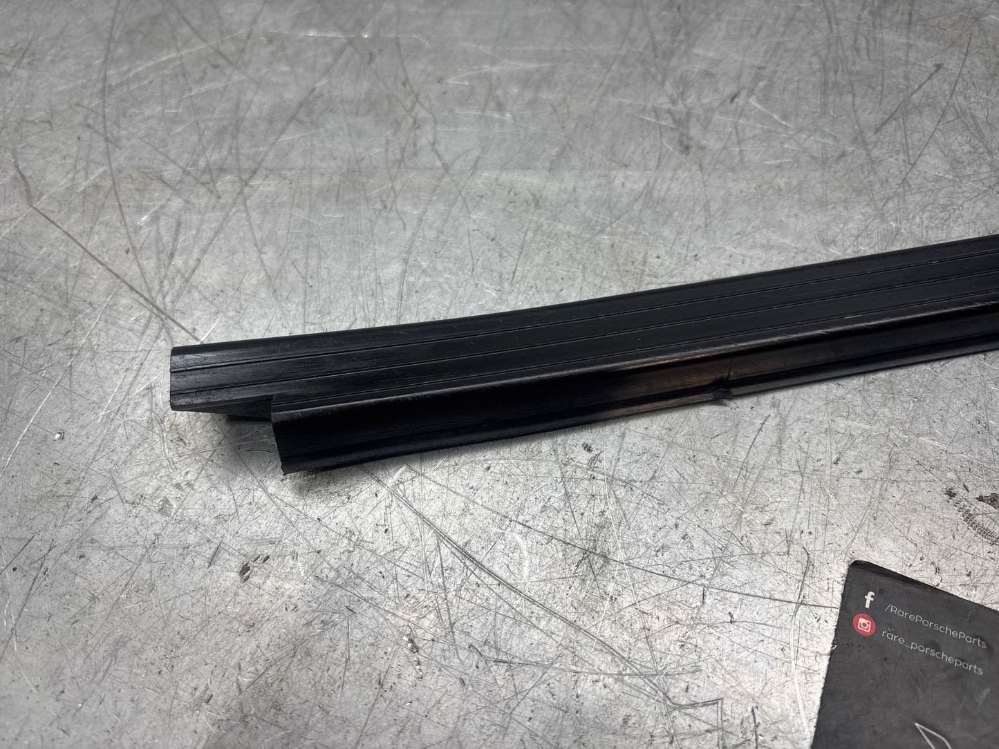 Porsche early 924/944 left sill trim, used 477853657A no cracks