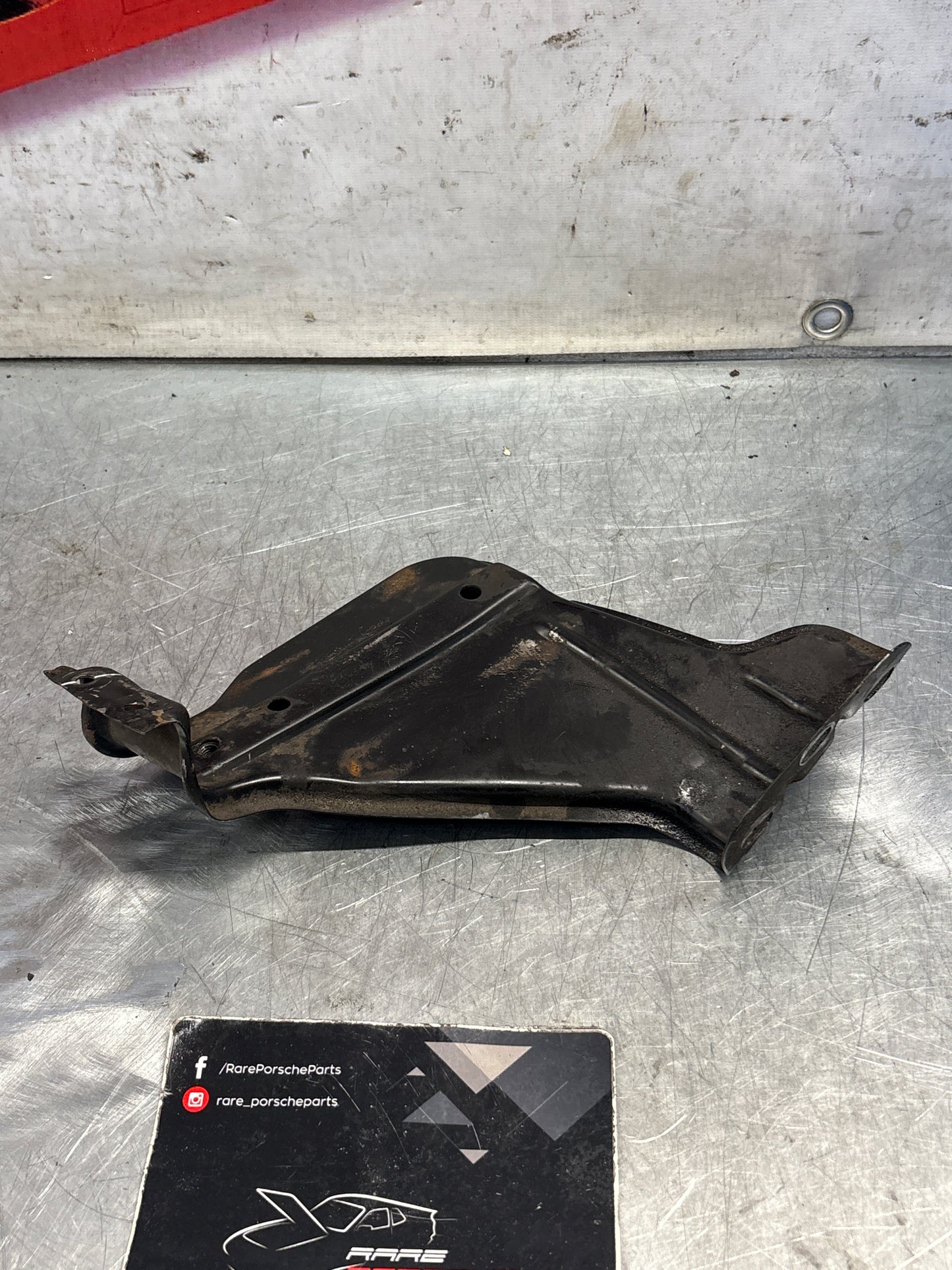 Porsche 924 coolant expansion tank bracket, used 477121413B