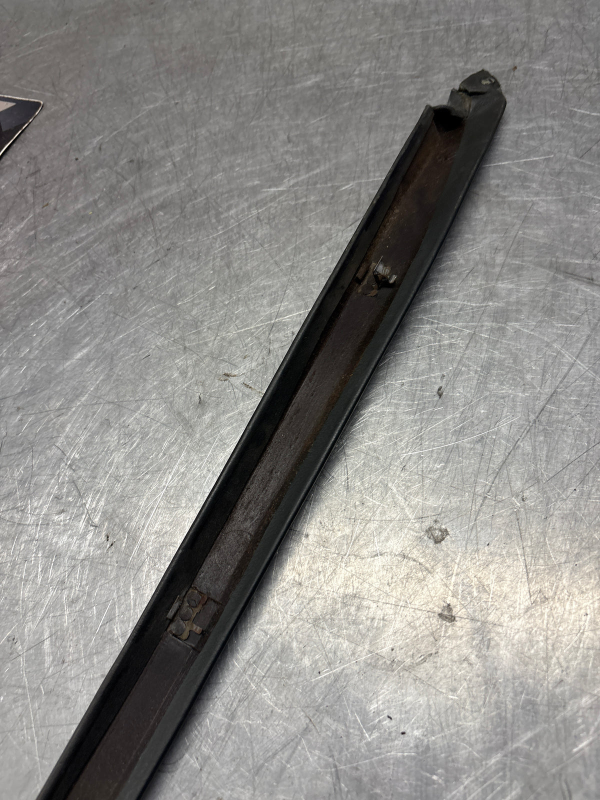 Porsche 928 left, off side door upper frame surround trim, green 92855502502, used