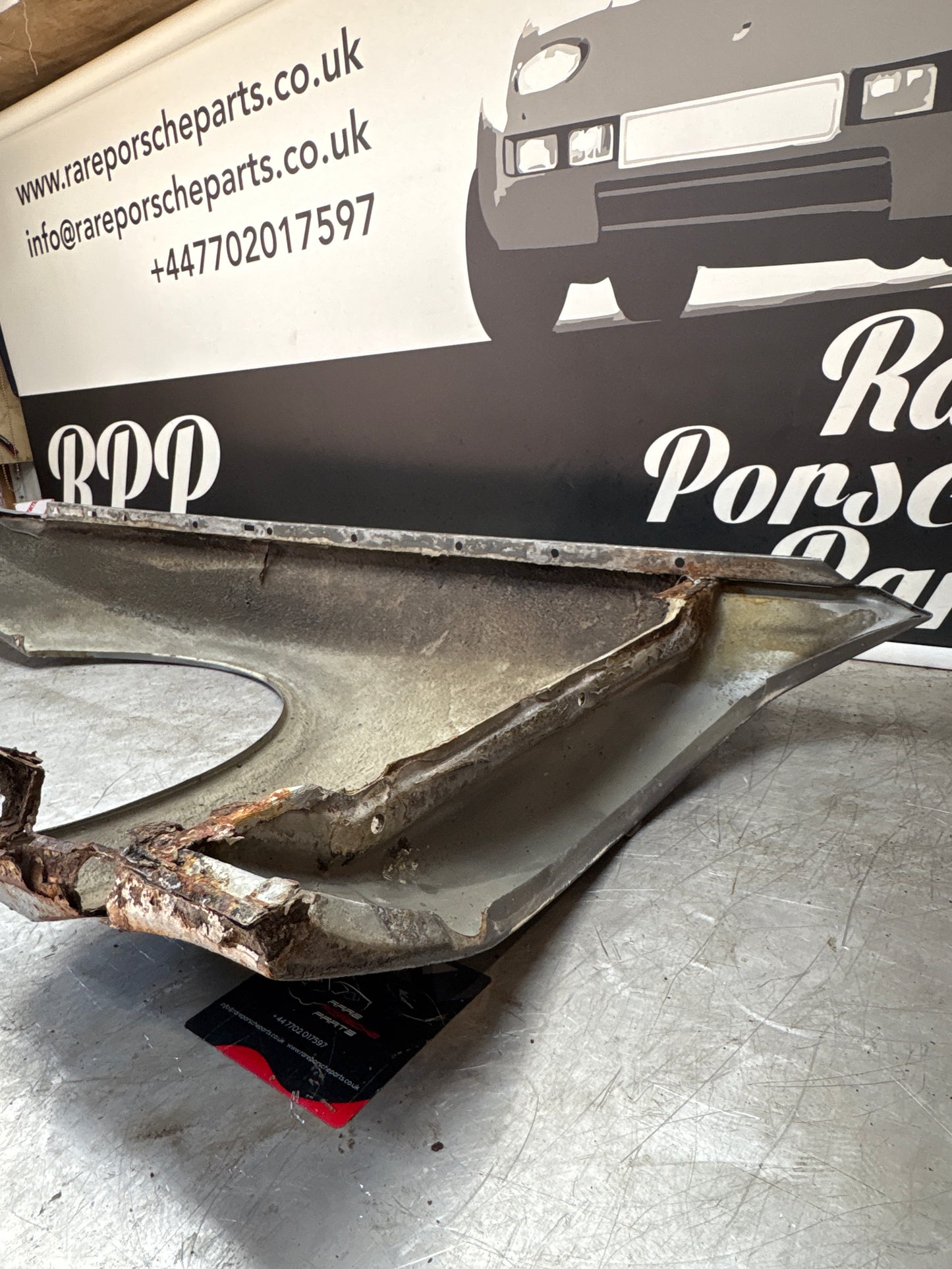 Porsche 944, early front right wing, in need of repair