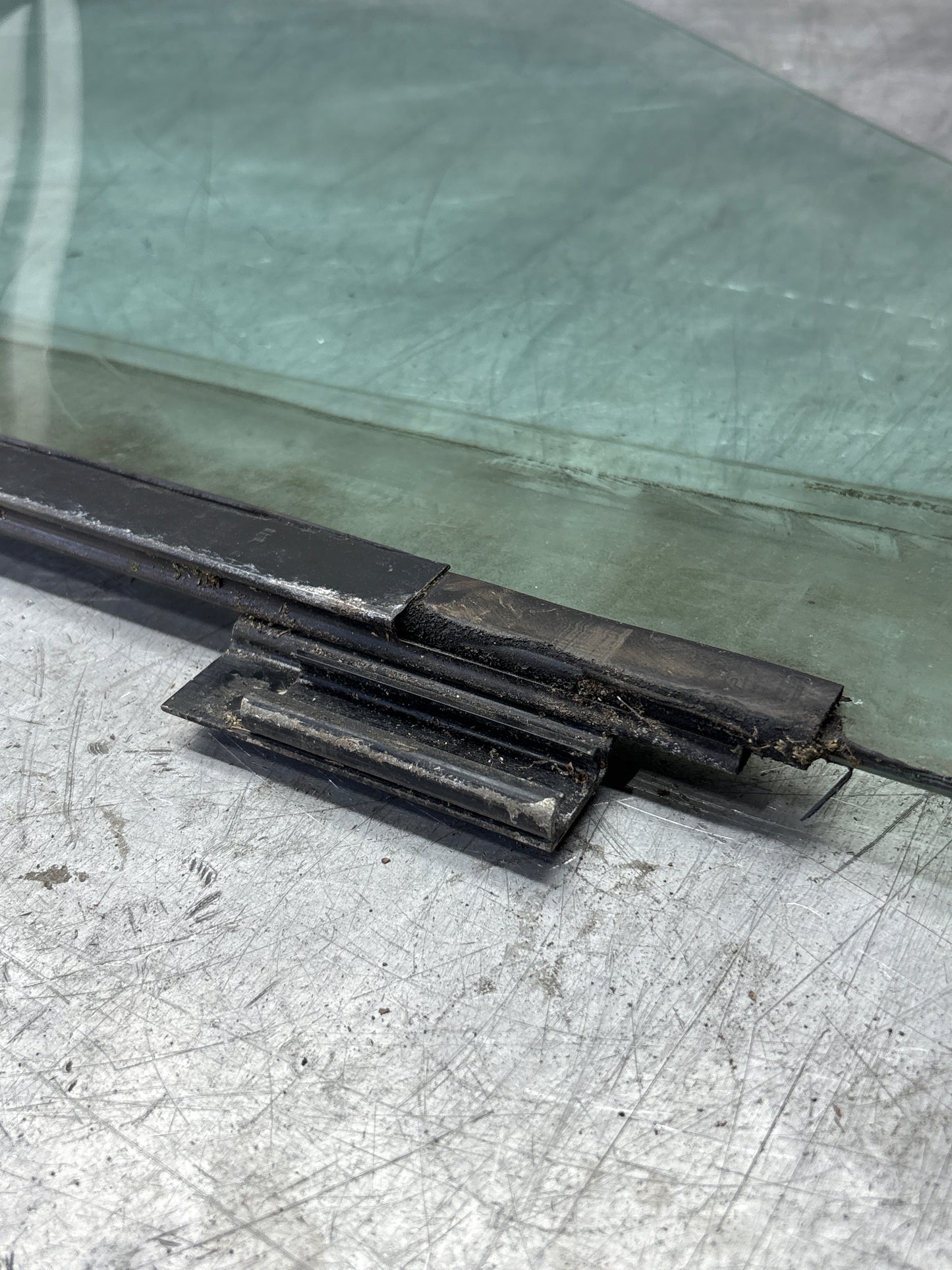 Porsche 944 Left side door glass, tinted green used 94454202301