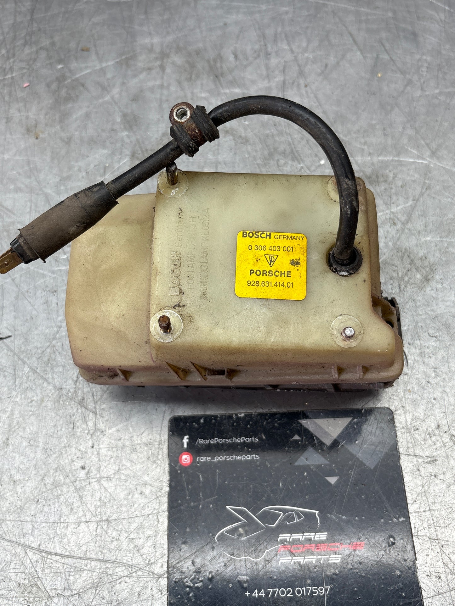 Porsche 928 Bosch headlight high beam, left 0306403001 / 92863141401