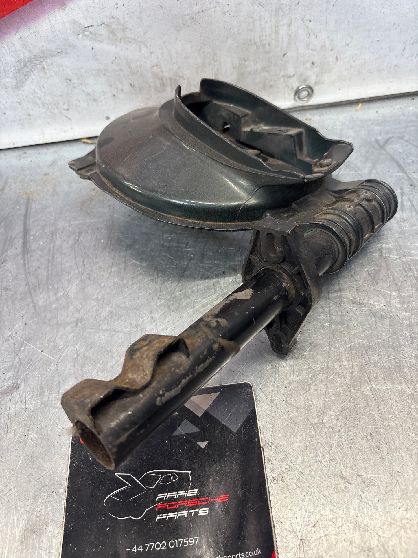 Porsche 928 right headlight swivel frame 92875024902 92875024302 used