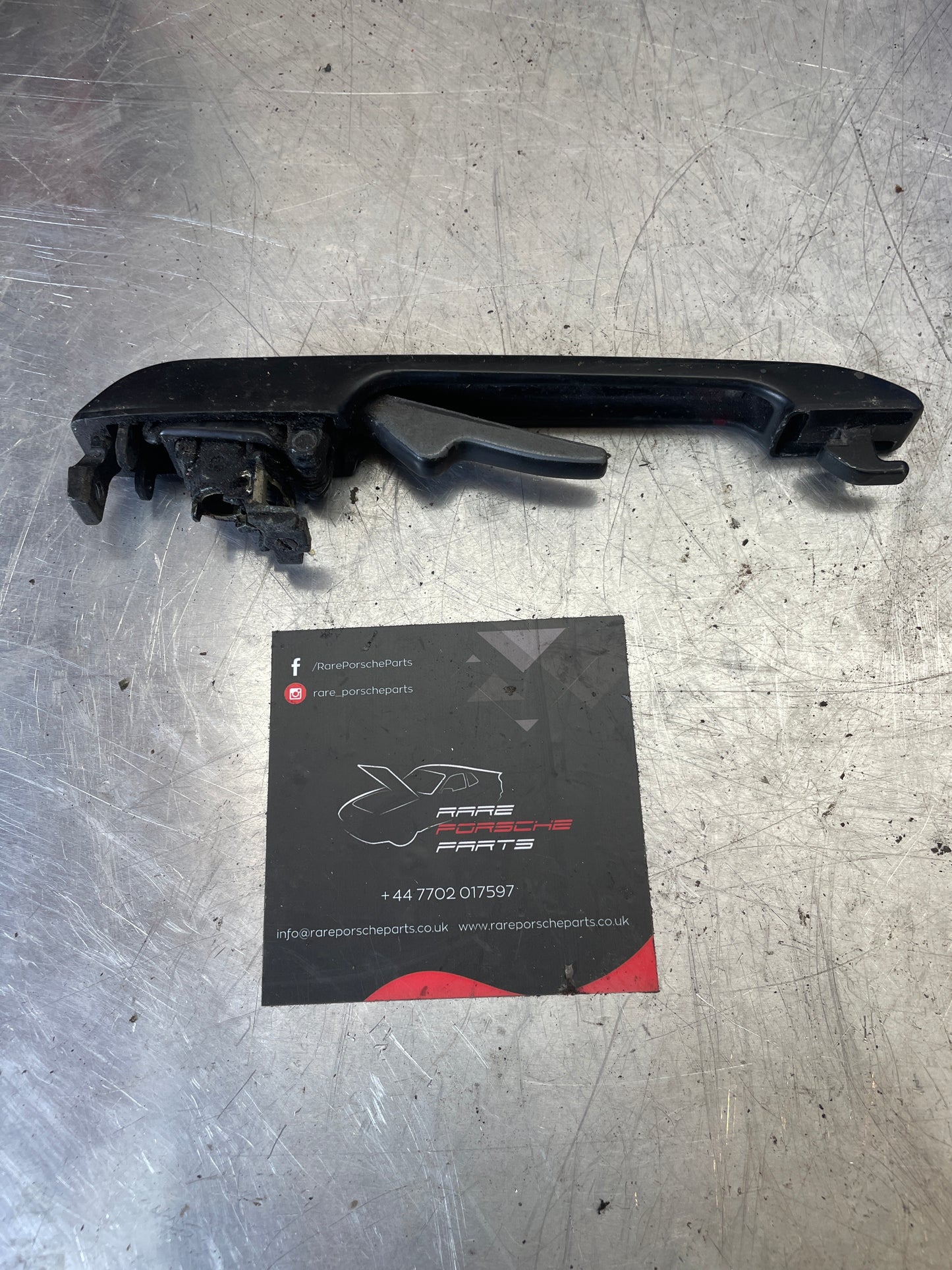 Porsche 944 left door handle, used 94453700102