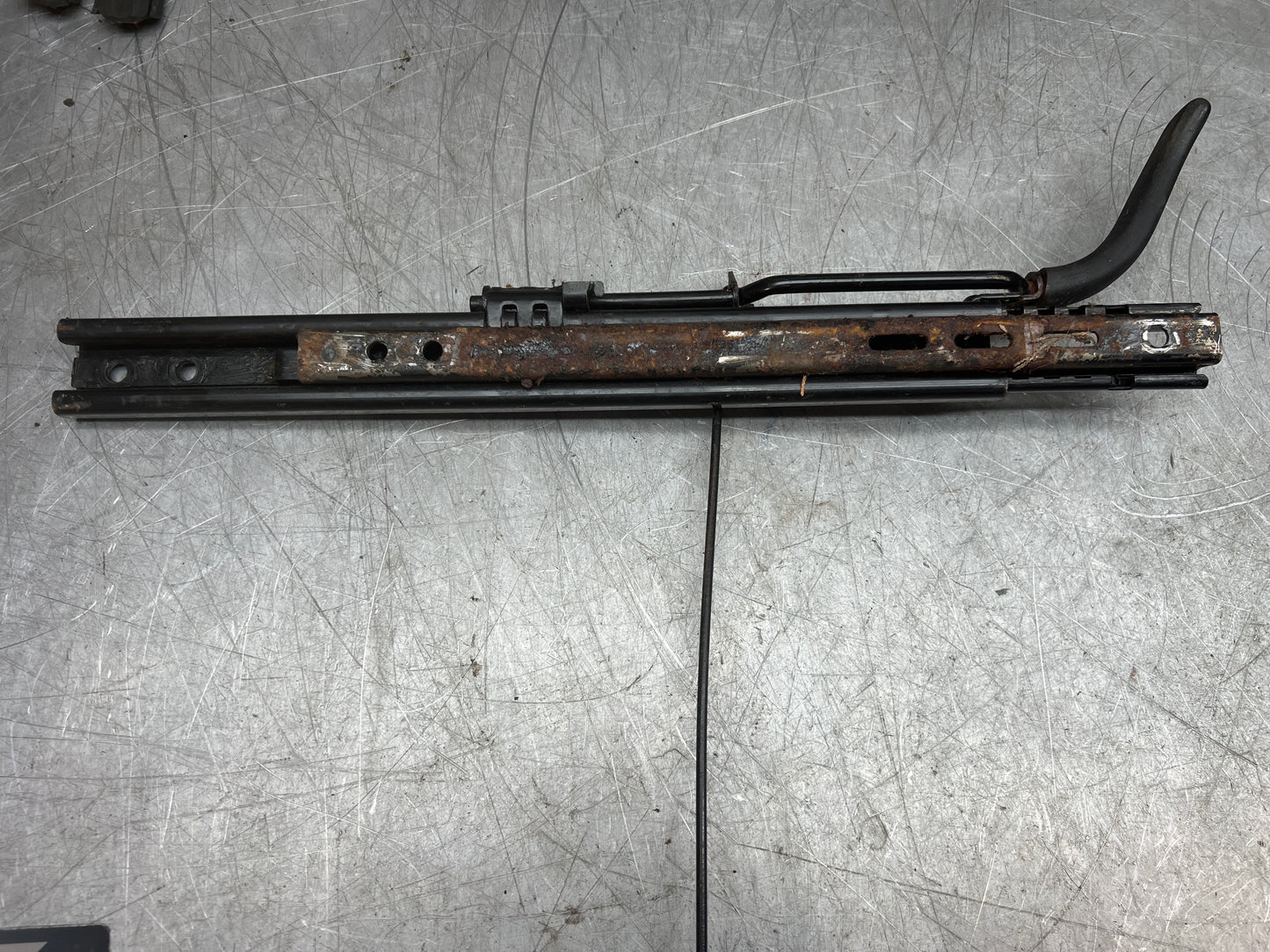 Porsche 944/968 pair of late type seat runners, manual, left side, used