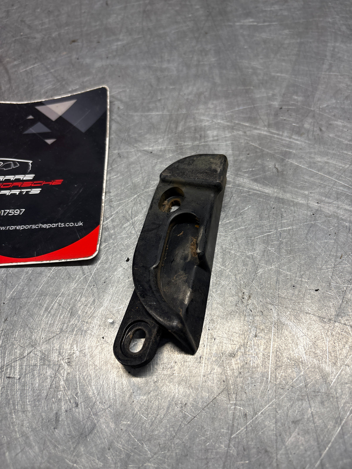 Porsche 911 964 cabriolet left roof latch guide plate, used 91156173903
