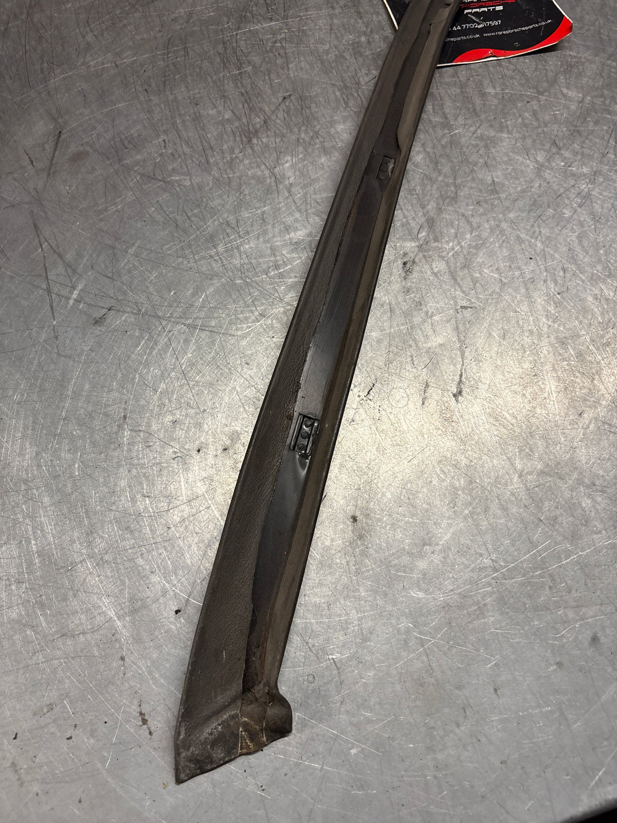 Porsche 928 left, off side door upper frame surround trim, grey 92855502502, used