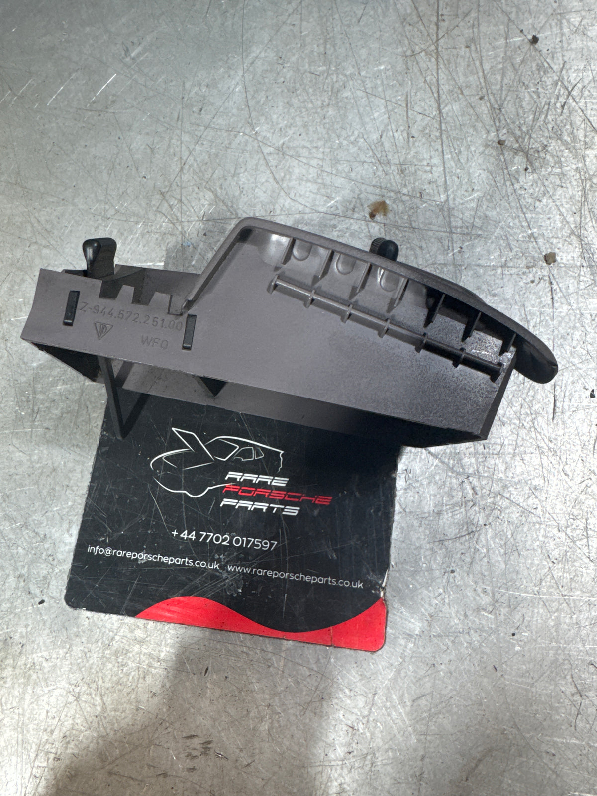 Porsche 944 grey right Interior dash air vent, black vents. 94457225100 used
