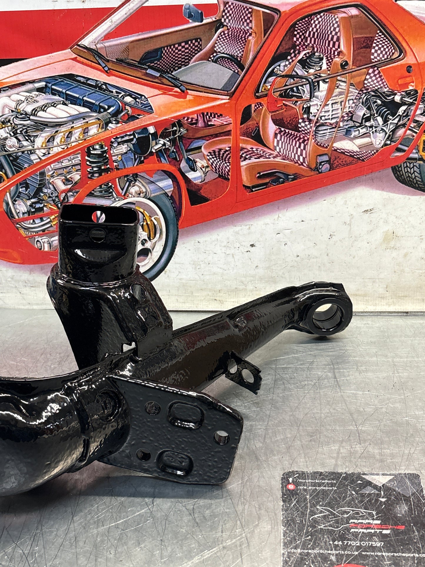 Porsche 924 944 -85.5 Rear left trailing arm, refurbished 94433102100