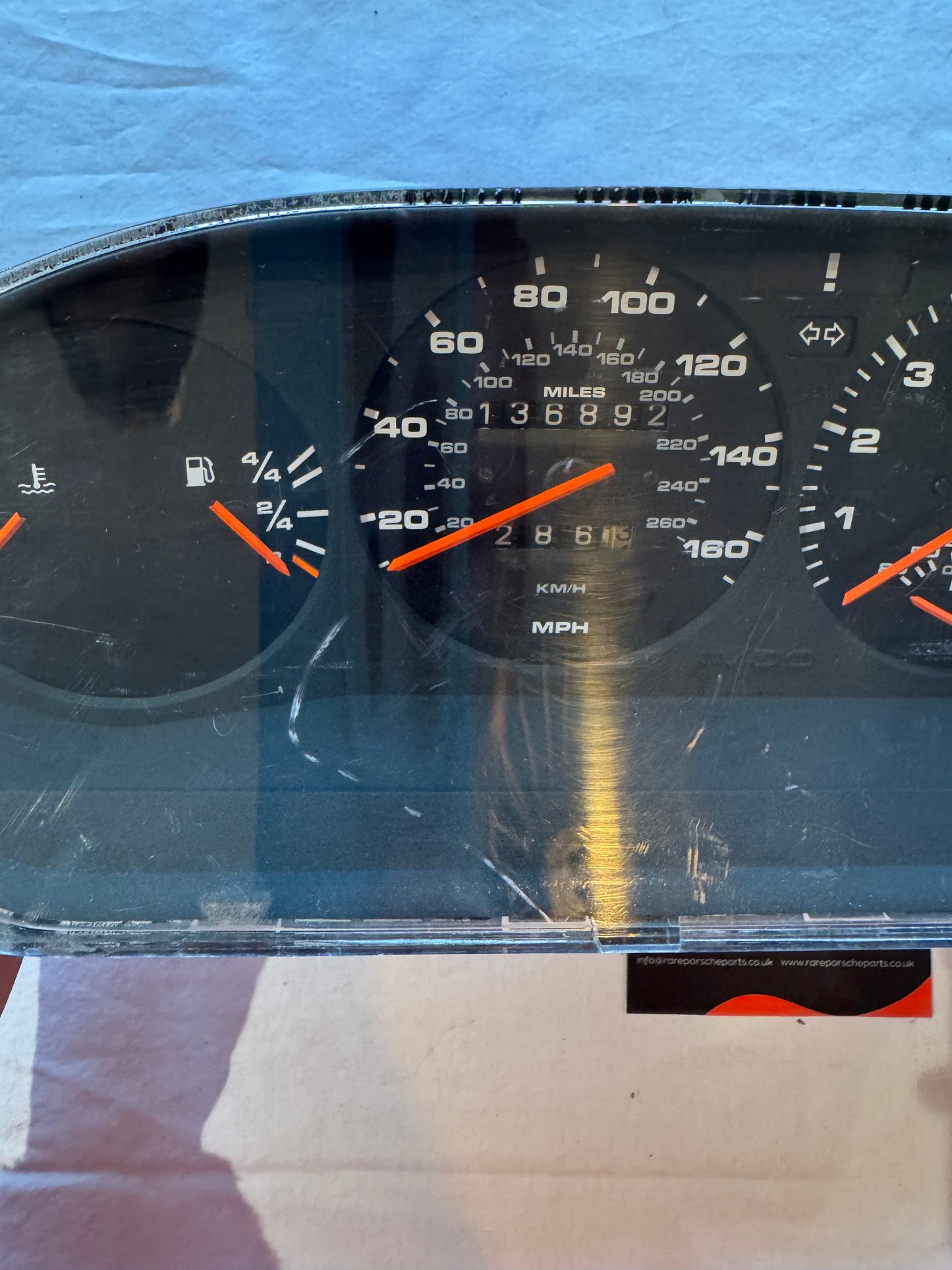 Porsche 944 dash clock binnacle pod speedometer, automatic 94564131101 used 136892 miles, scratched screen