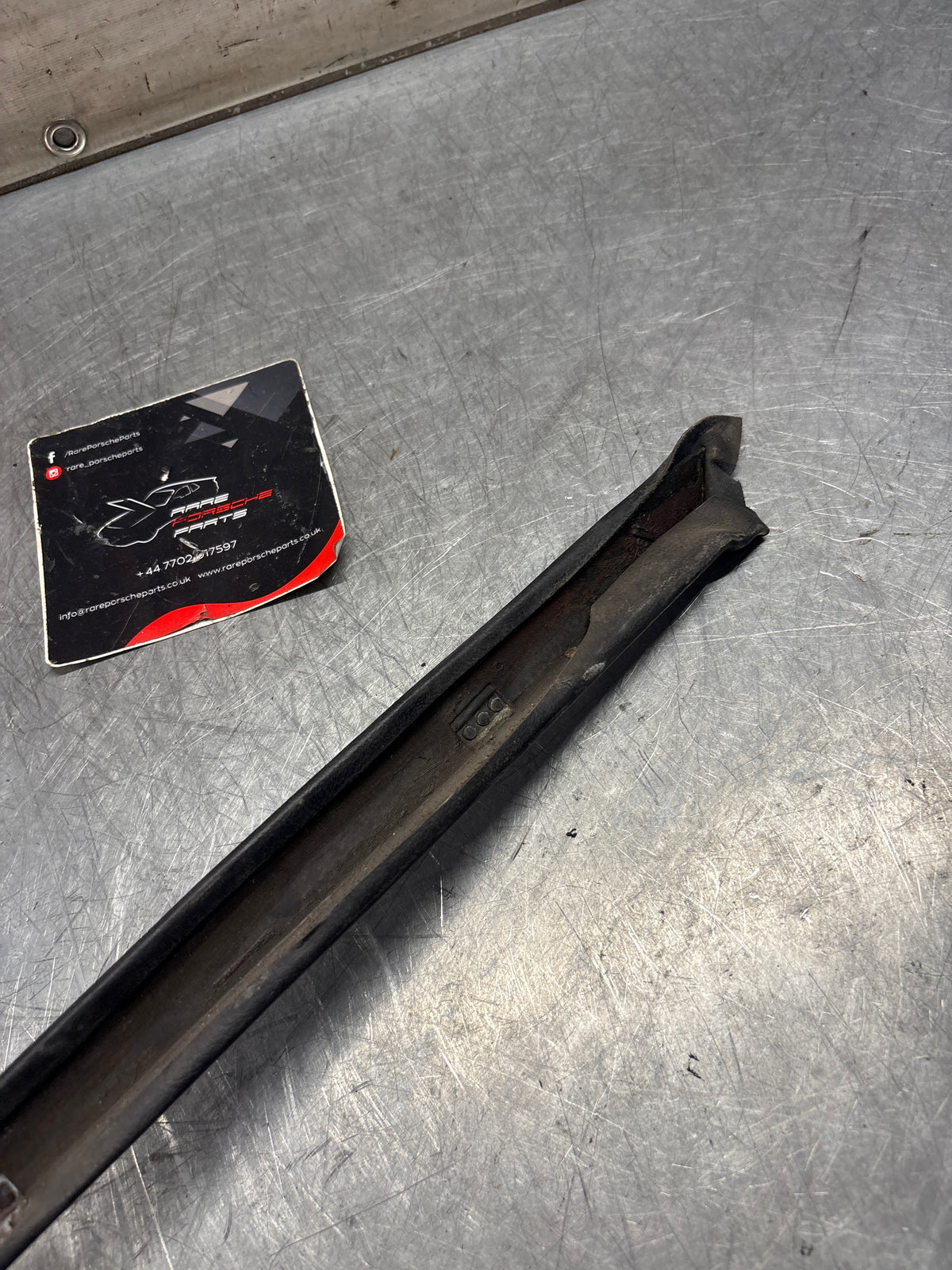 Porsche 928 right, off side door upper frame surround trim, black 92855502602, used