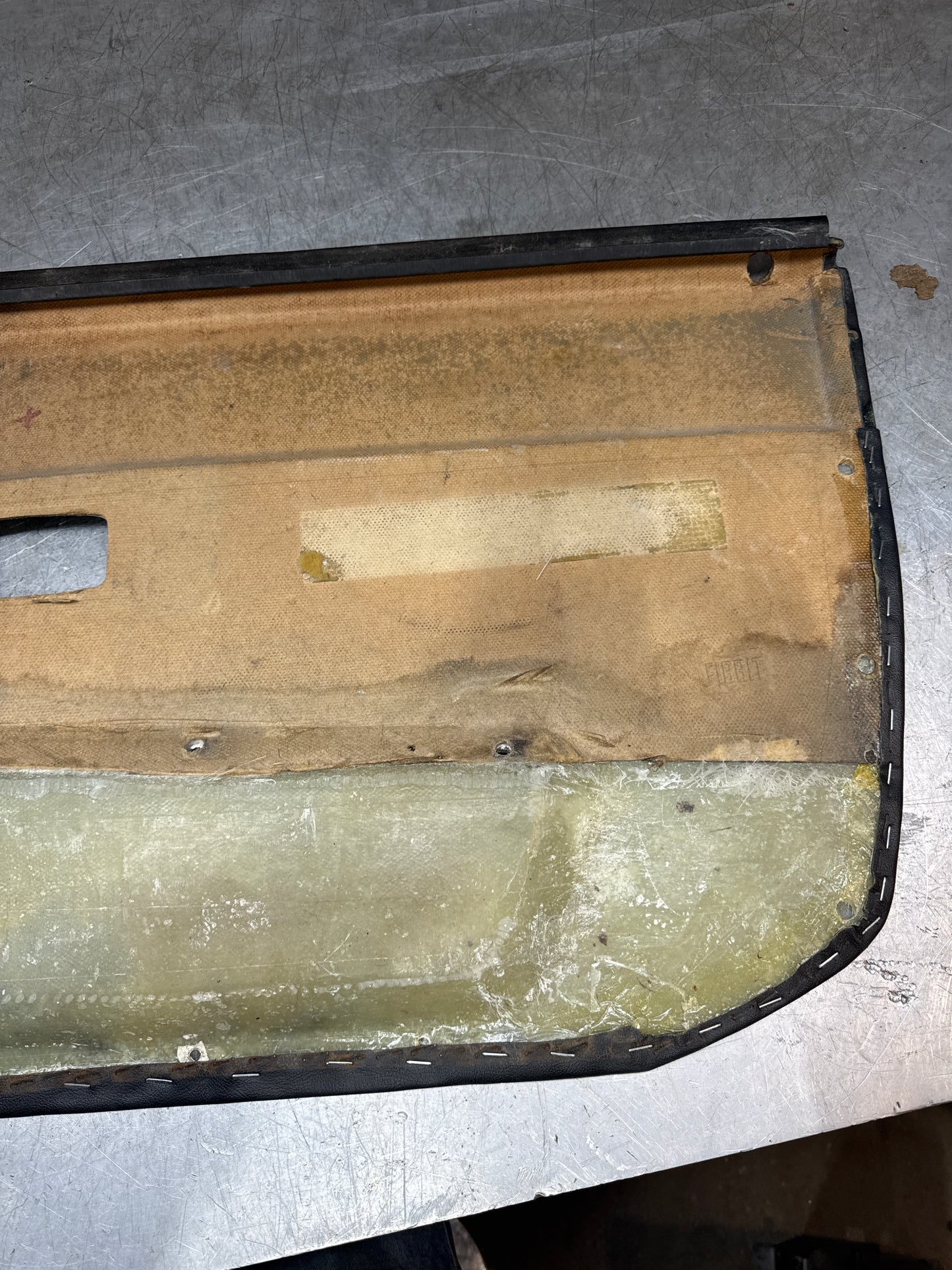 Porsche 944 left black door card for late cars from 85.5. Fibreglass repair.