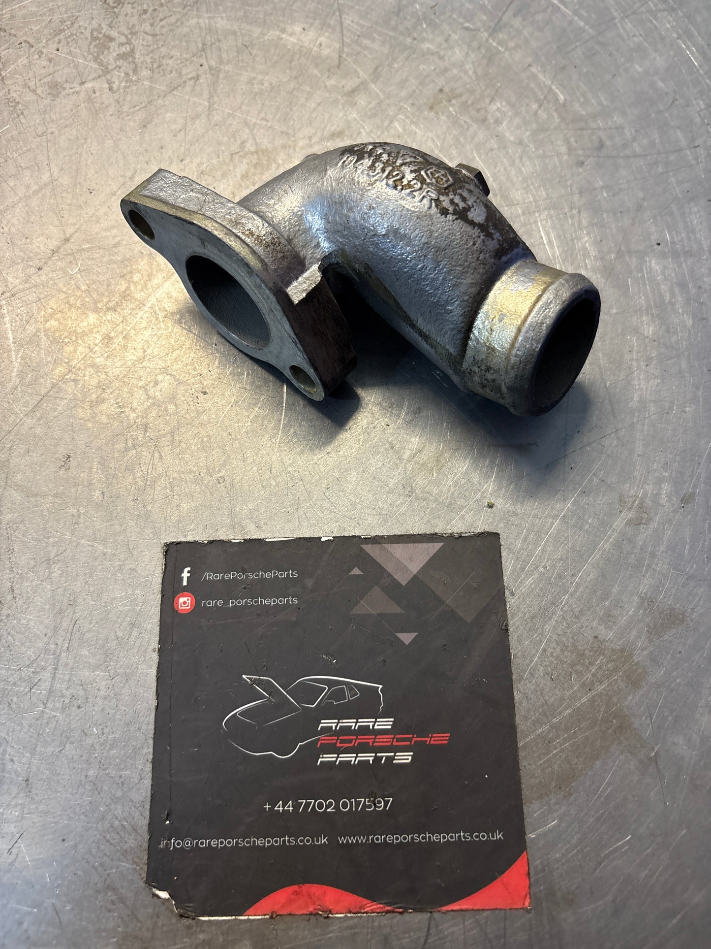 Porsche 944 water cooling socket, neck, 9441043122R used