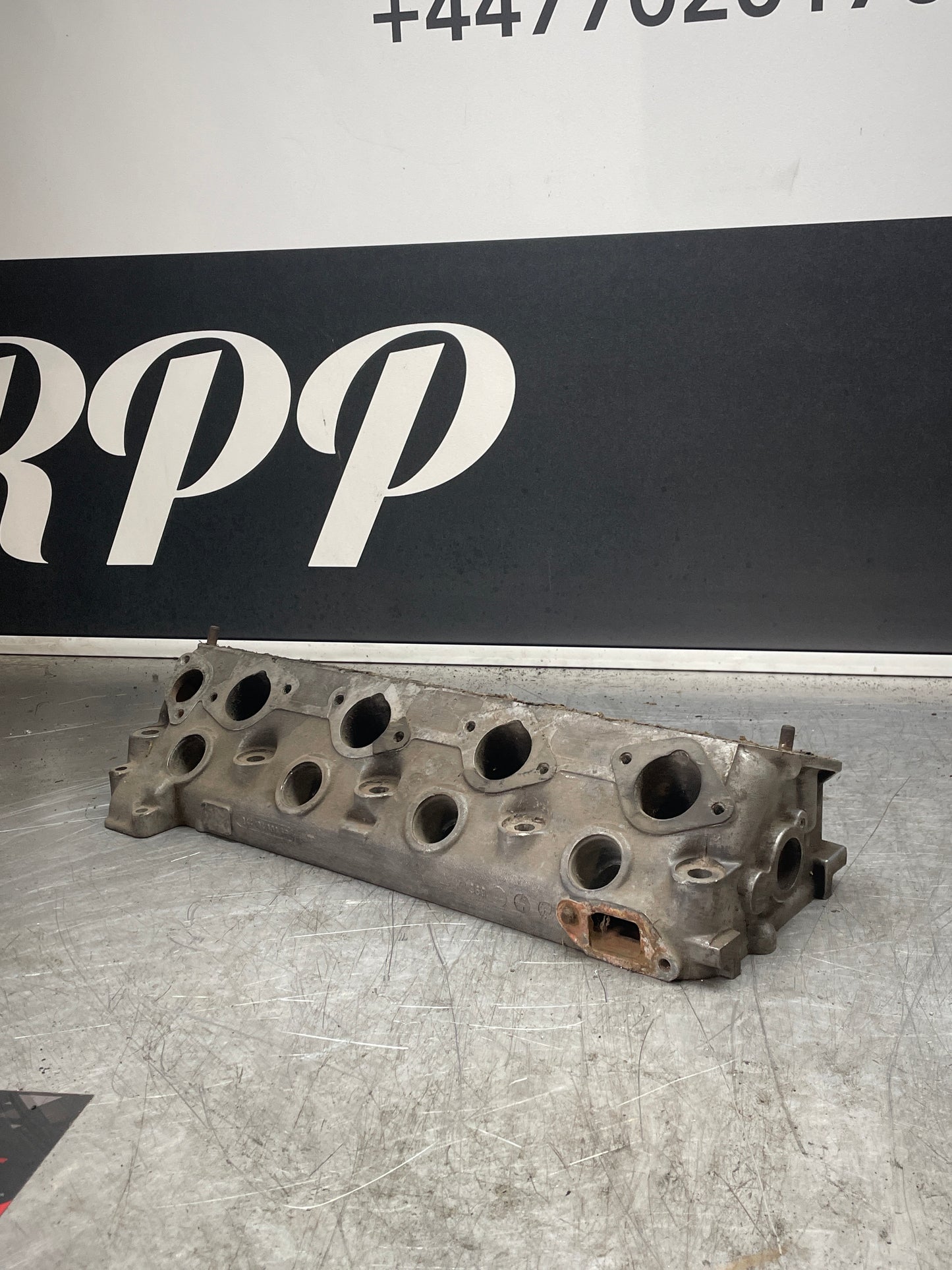 Porsche 924S 944 8V Cylinder head, without valves, used 9441043036R