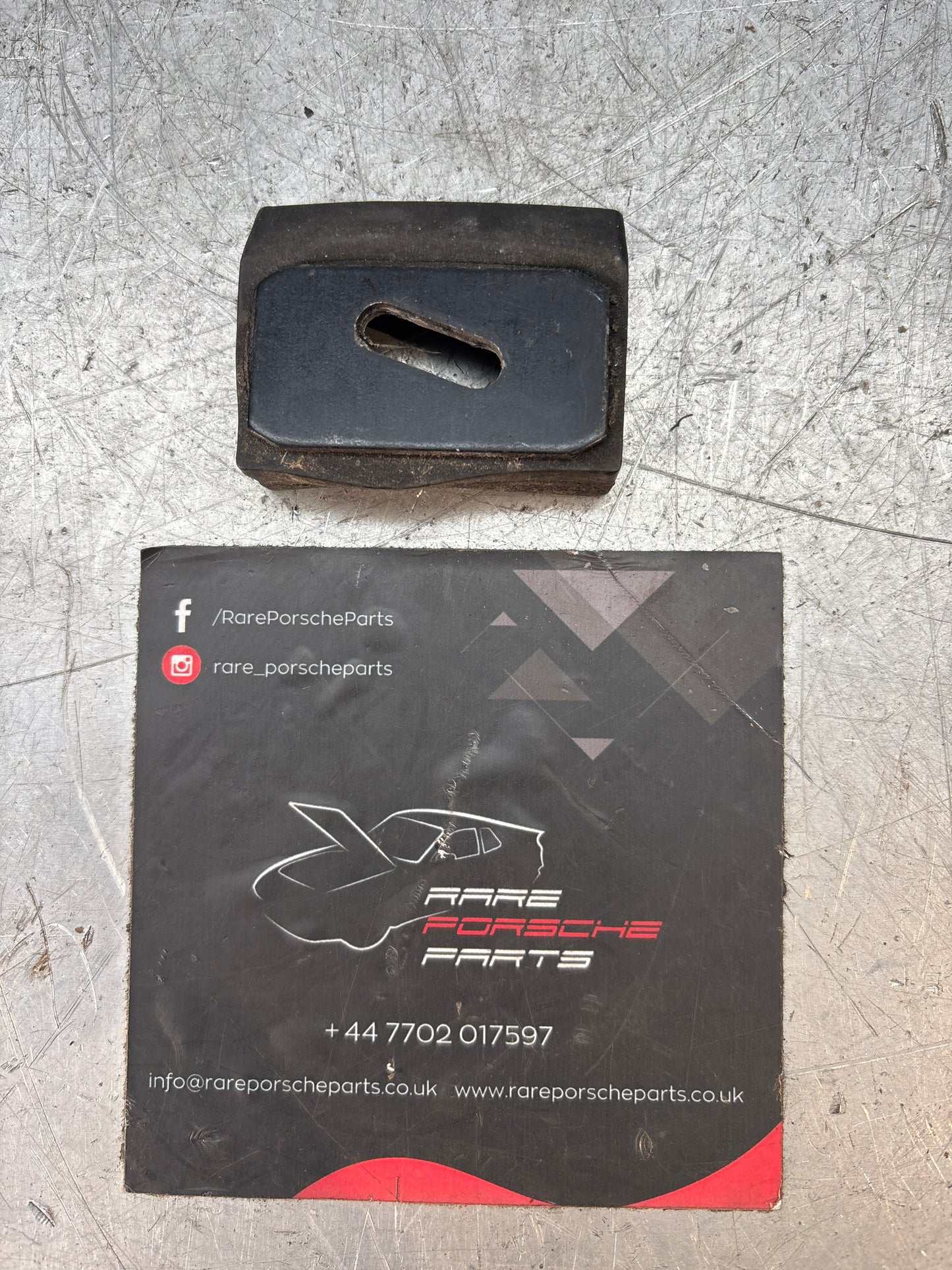 Porsche 928 boot lid guide wedge, used 92851205702