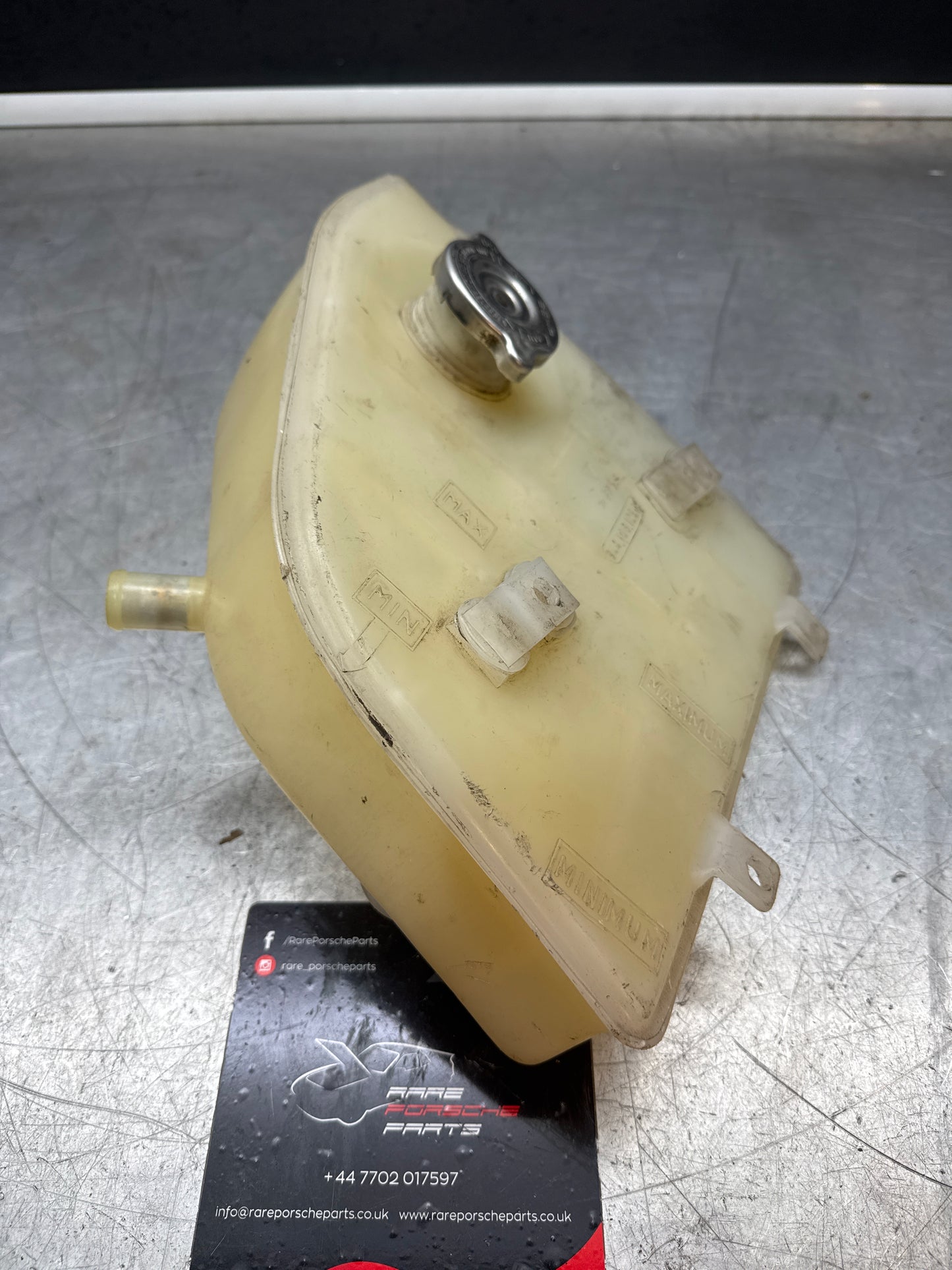 Porsche 944 expansion tank. 94410612508 used