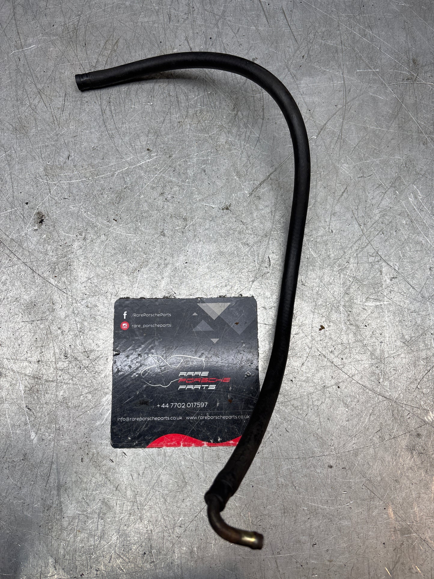 Porsche 944 hose 600mm 99918115250, with connecting piece 95111019000 used
