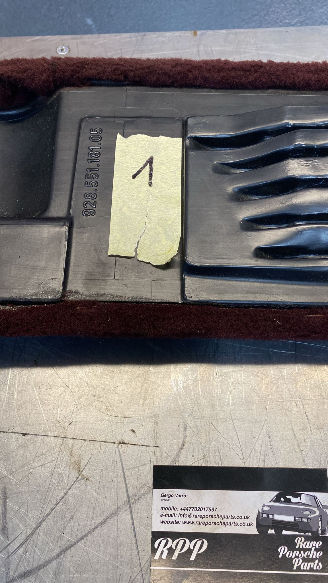 Porsche 928 burgundy carpeted Tool kit panel cover, used 92855118105