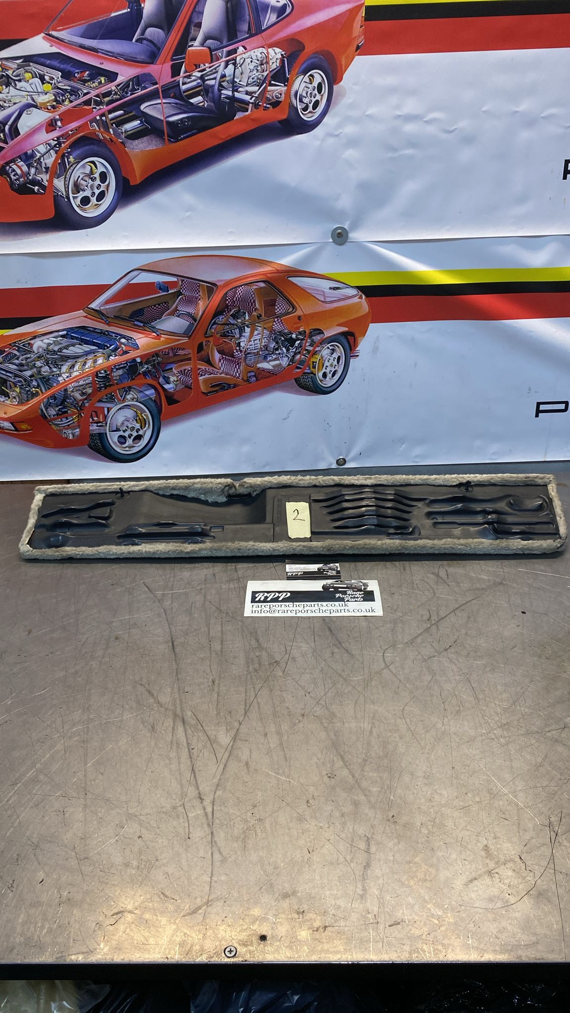 Porsche 928 white cream carpeted Tool kit panel cover, used 92855118106