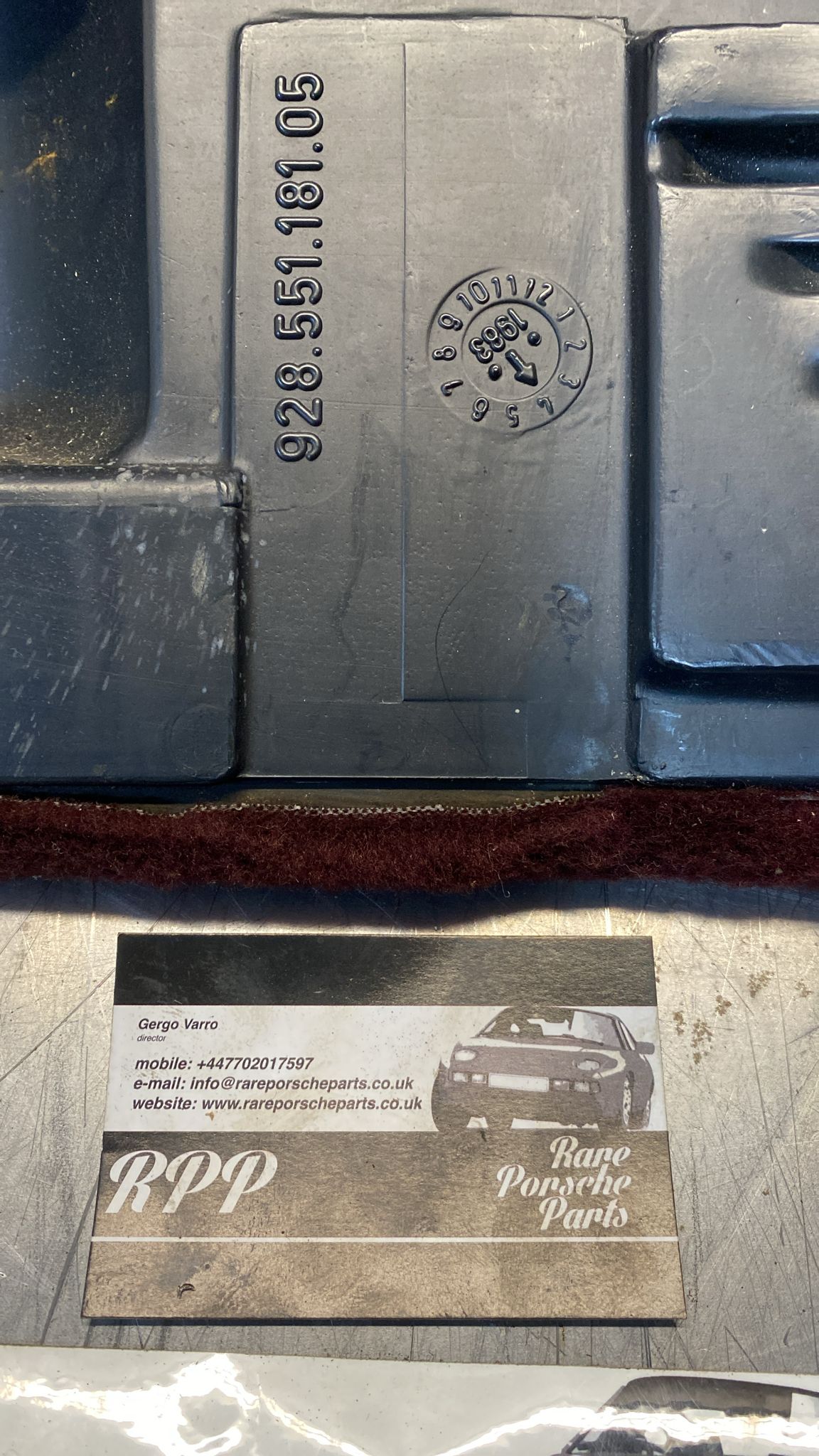 Porsche 928 burgundy carpeted Tool kit panel cover, used 92855118105