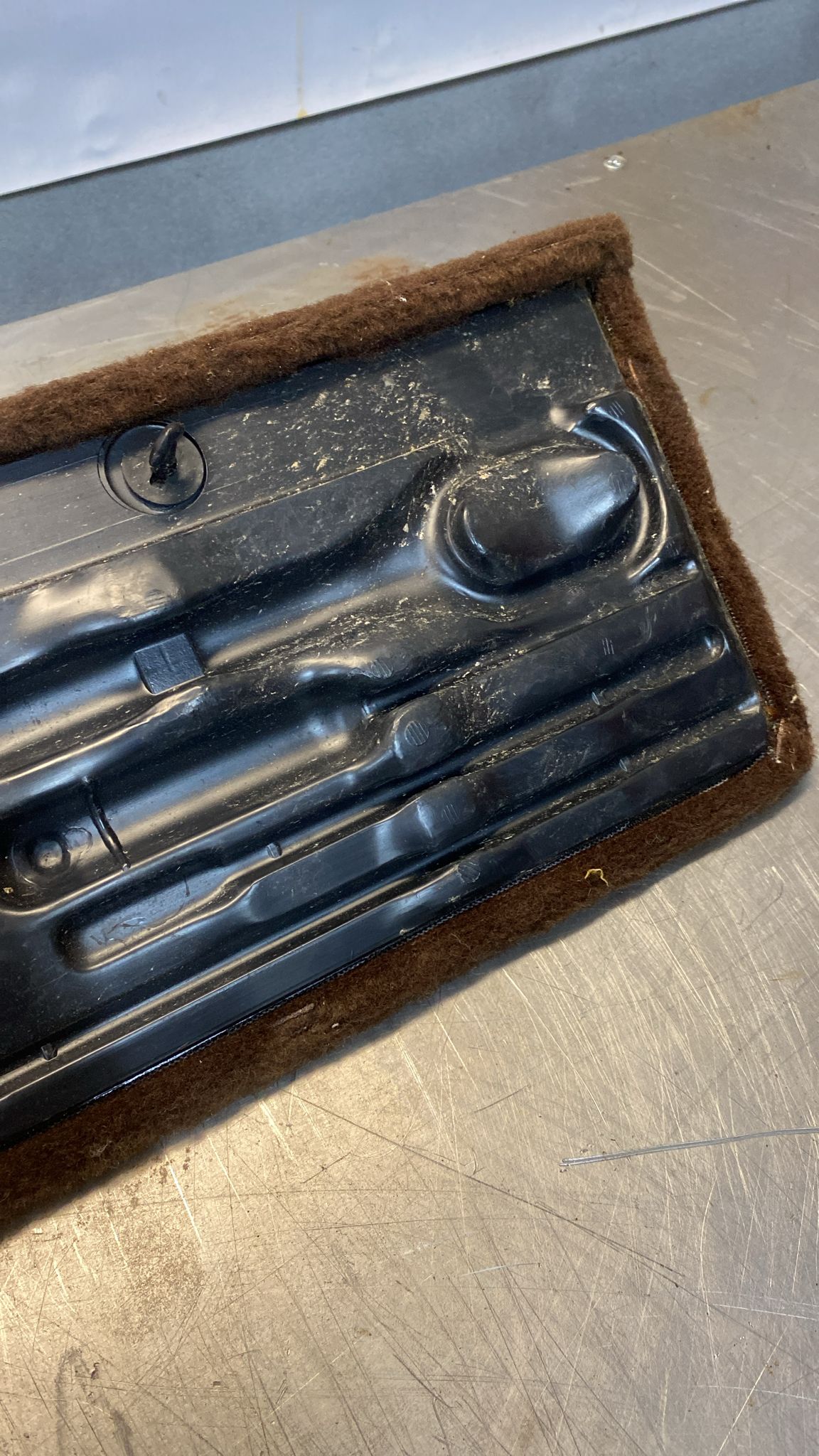 Porsche 928 brown carpeted Tool kit panel cover, used 92855118105