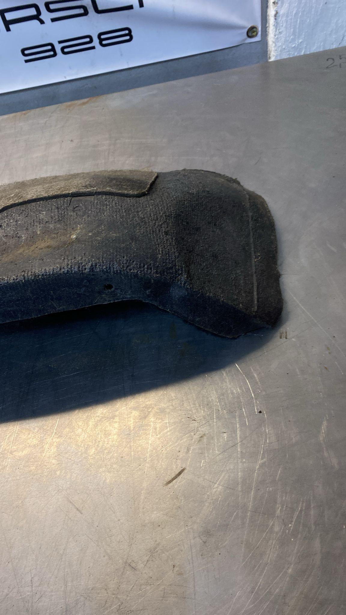 Porsche 924/944 85.5- rear left side trim carpet, black, 94455508301, used