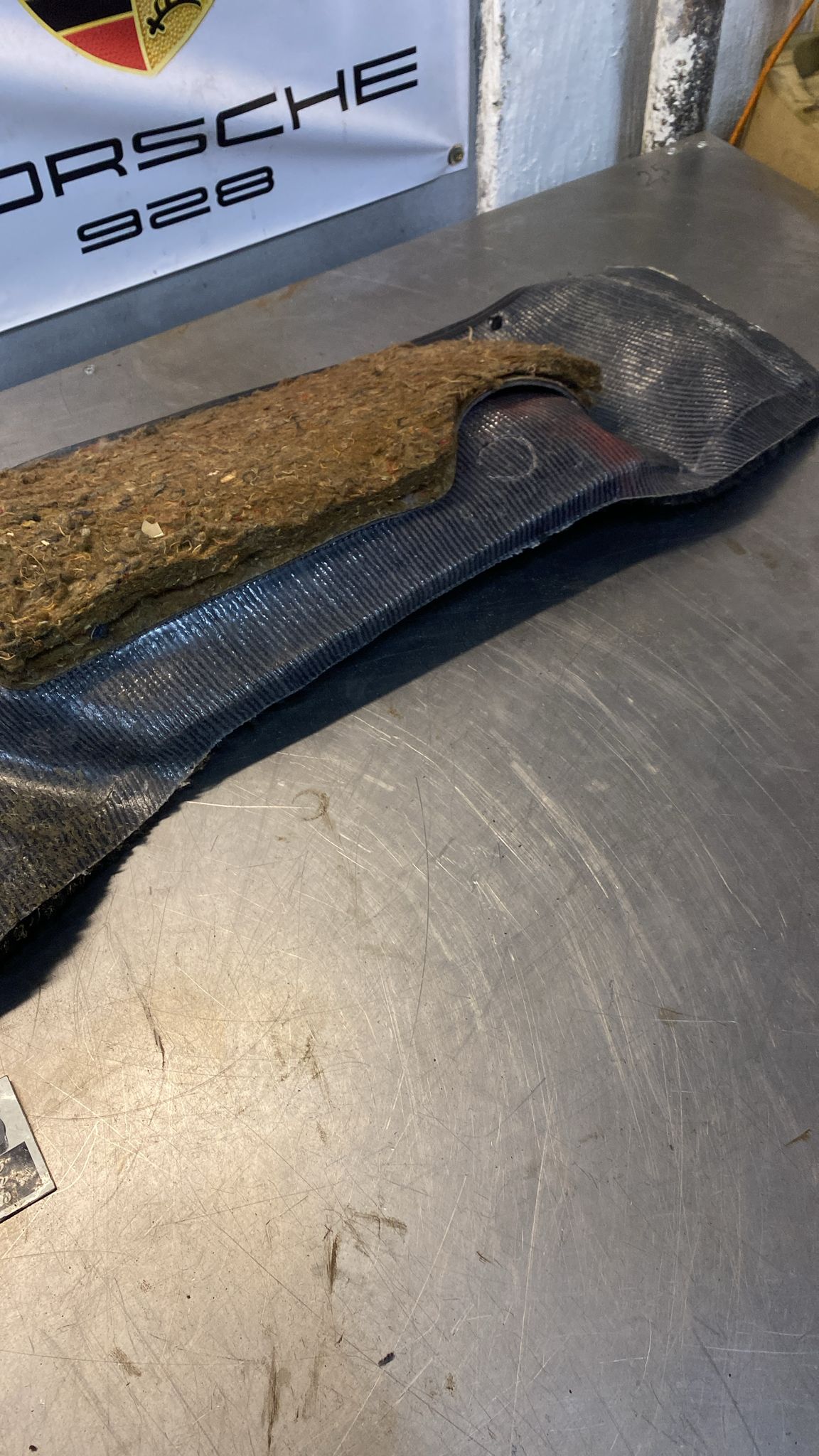 Porsche 924/944 -85.5 rear left side trim carpet, black, 944555083, used