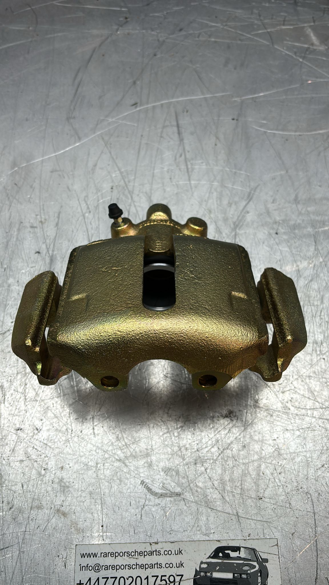 Porsche 928 S front left brake caliper, refurbished (exchange)